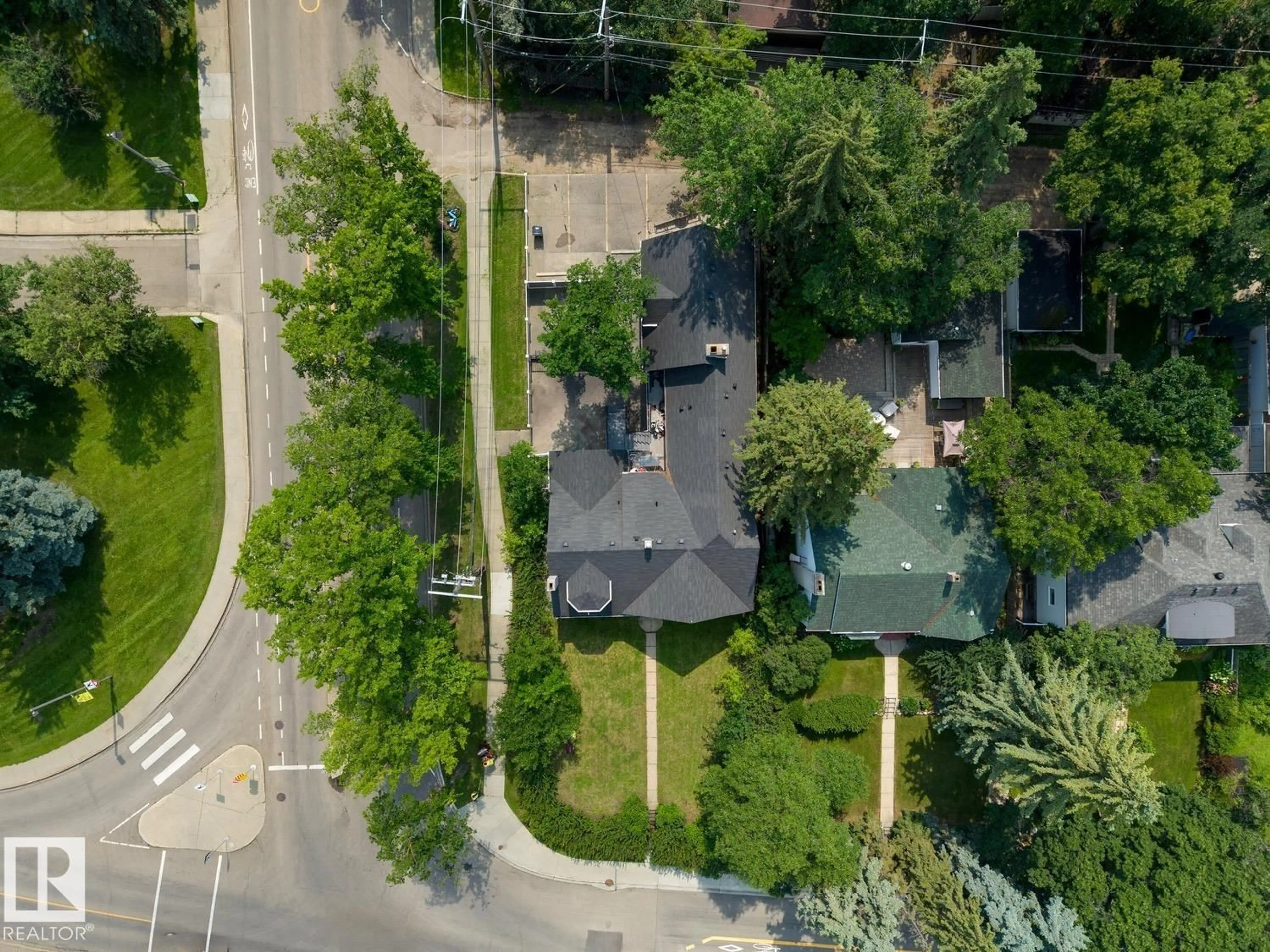 A pic from outside/outdoor area/front of a property/back of a property/a pic from drone, street for 11603 SASKATCHEWAN DR, Edmonton Alberta T6G2B5