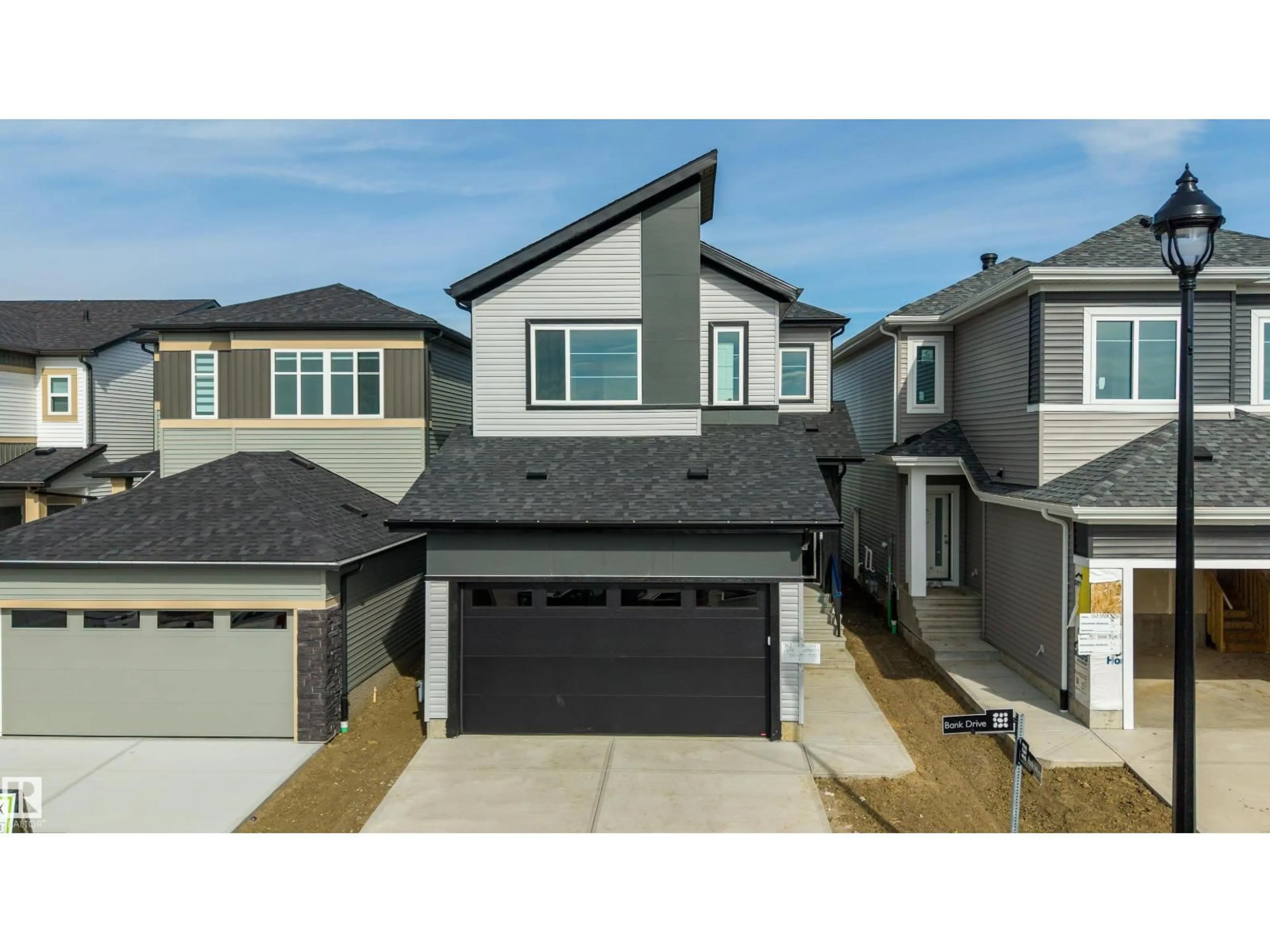 Home with vinyl exterior material, street for 782 BANK DR, Leduc Alberta T9E1G2
