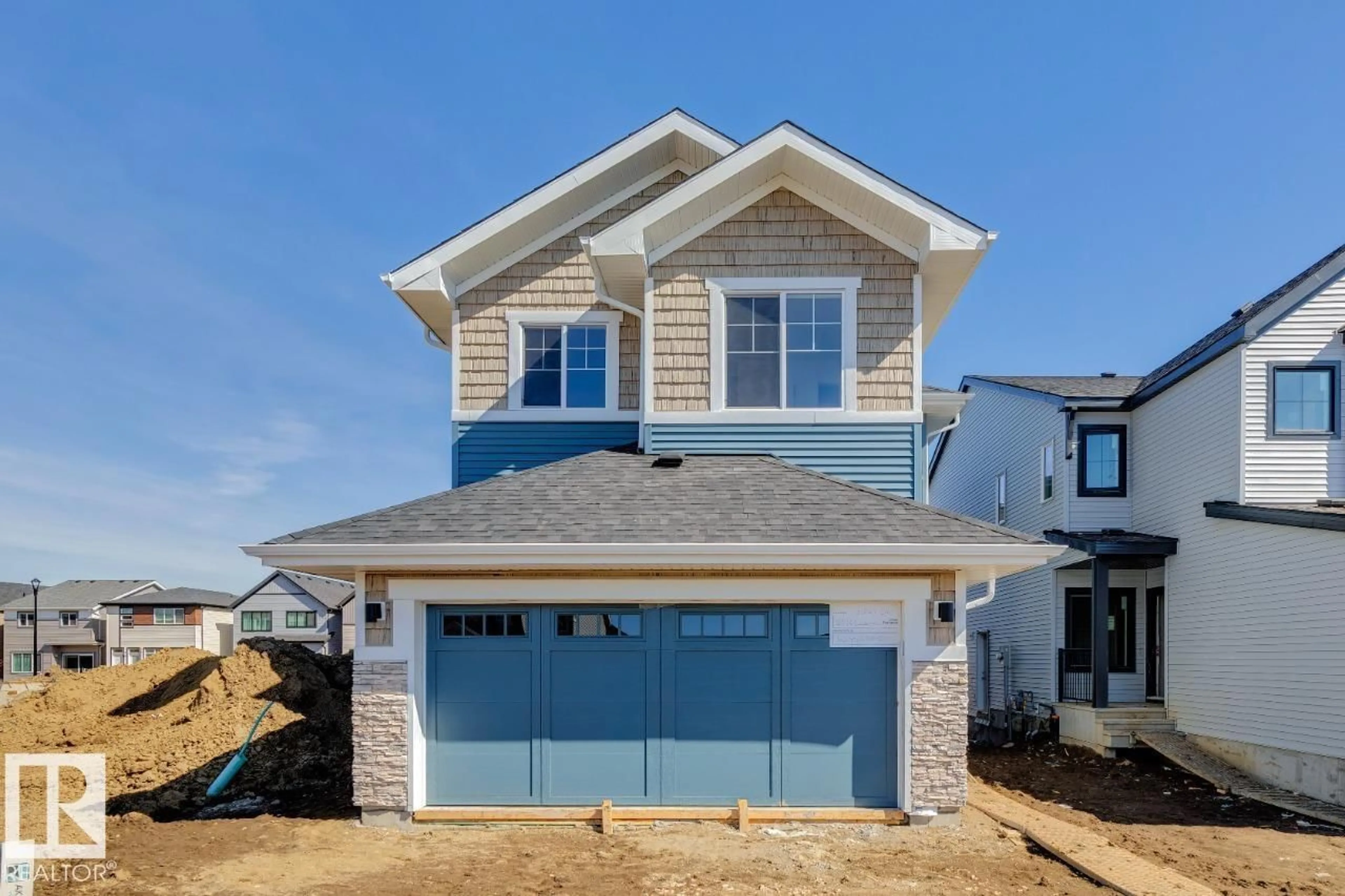 Home with vinyl exterior material, street for SW - 5033 CAWSEY LI, Edmonton Alberta T6W4B5
