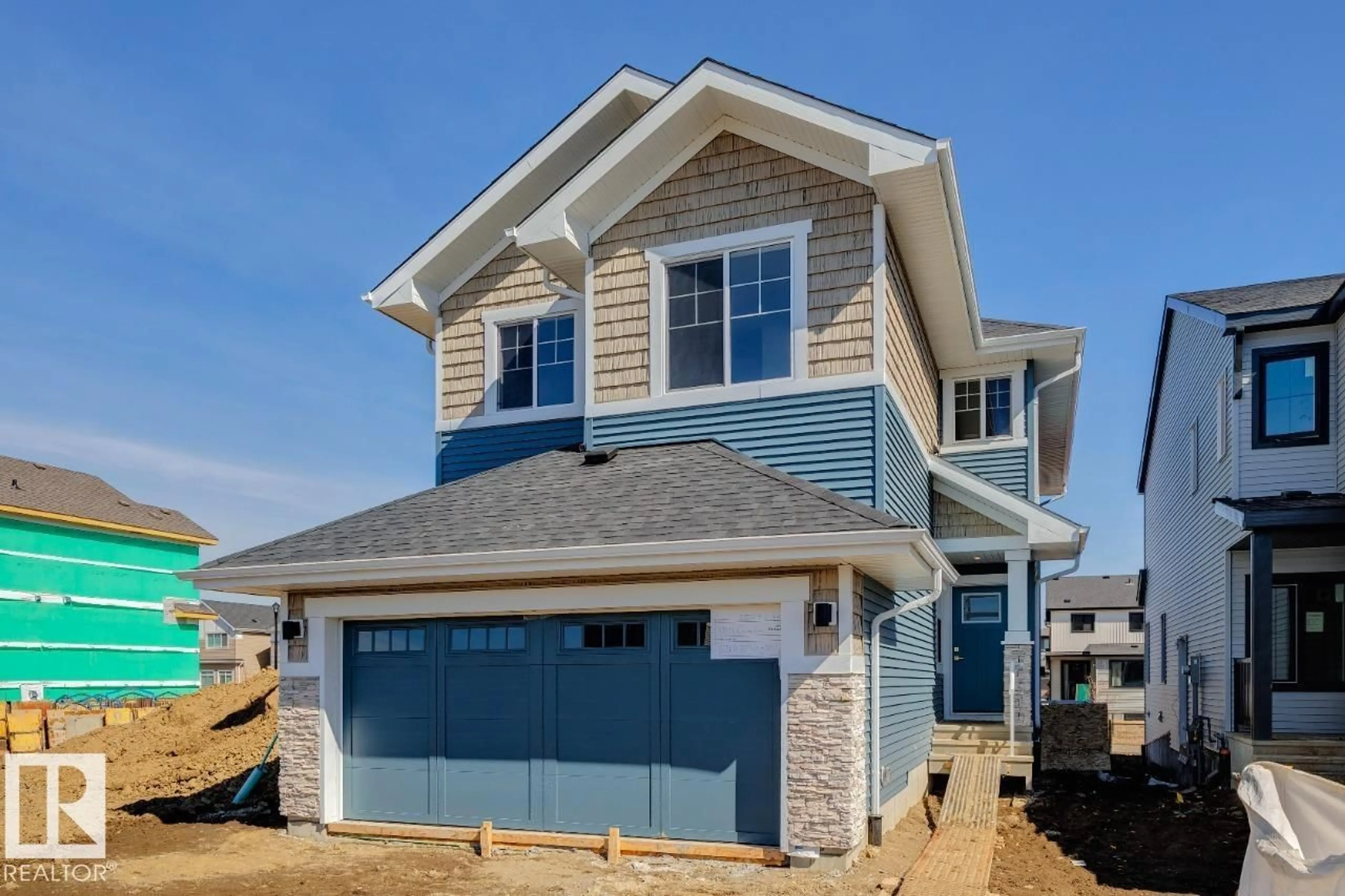 Home with vinyl exterior material, street for SW - 5033 CAWSEY LI, Edmonton Alberta T6W4B5