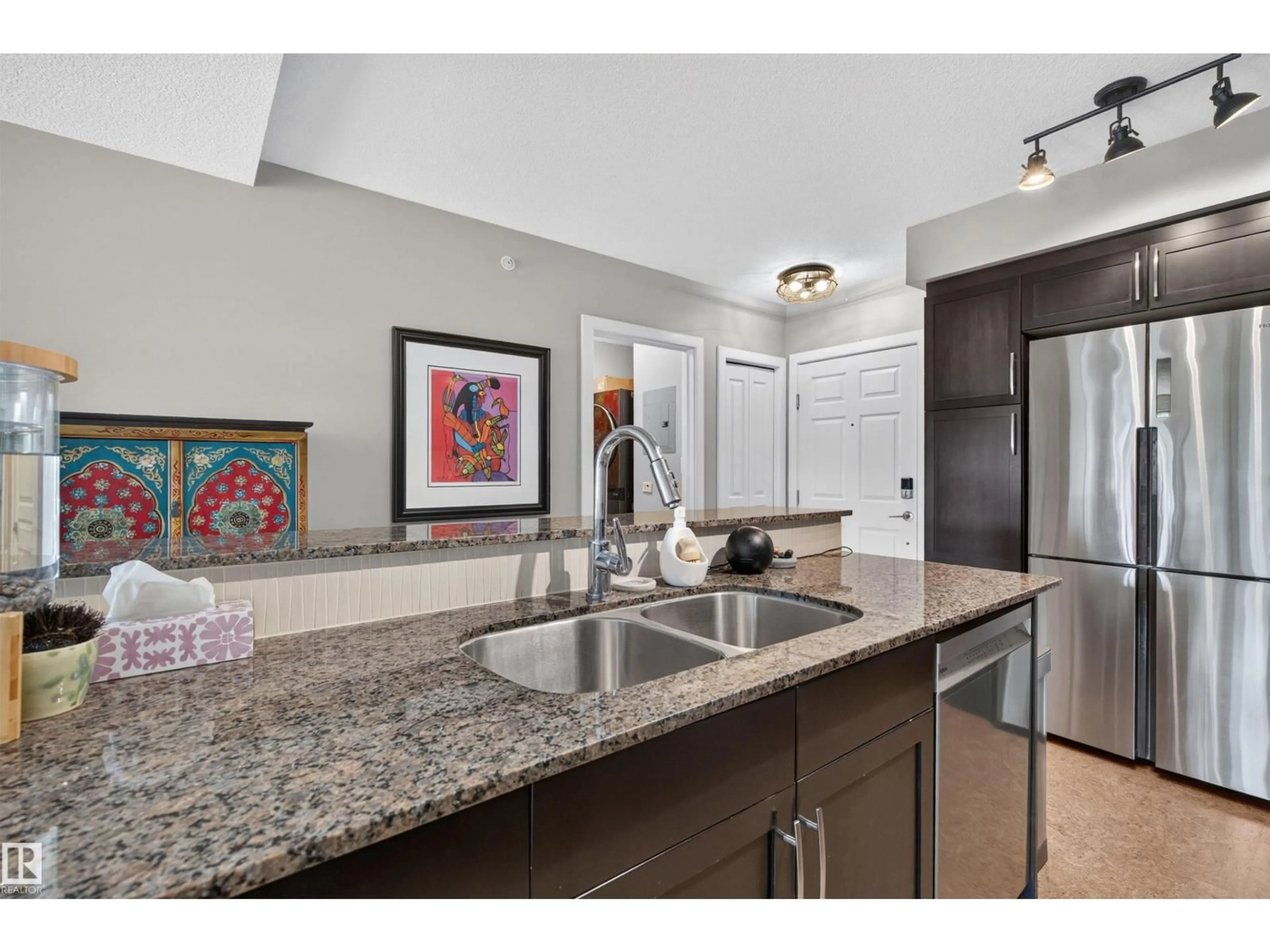 Open concept kitchen, unknown for #301 - 9603 98 AV, Edmonton Alberta T6C2E2