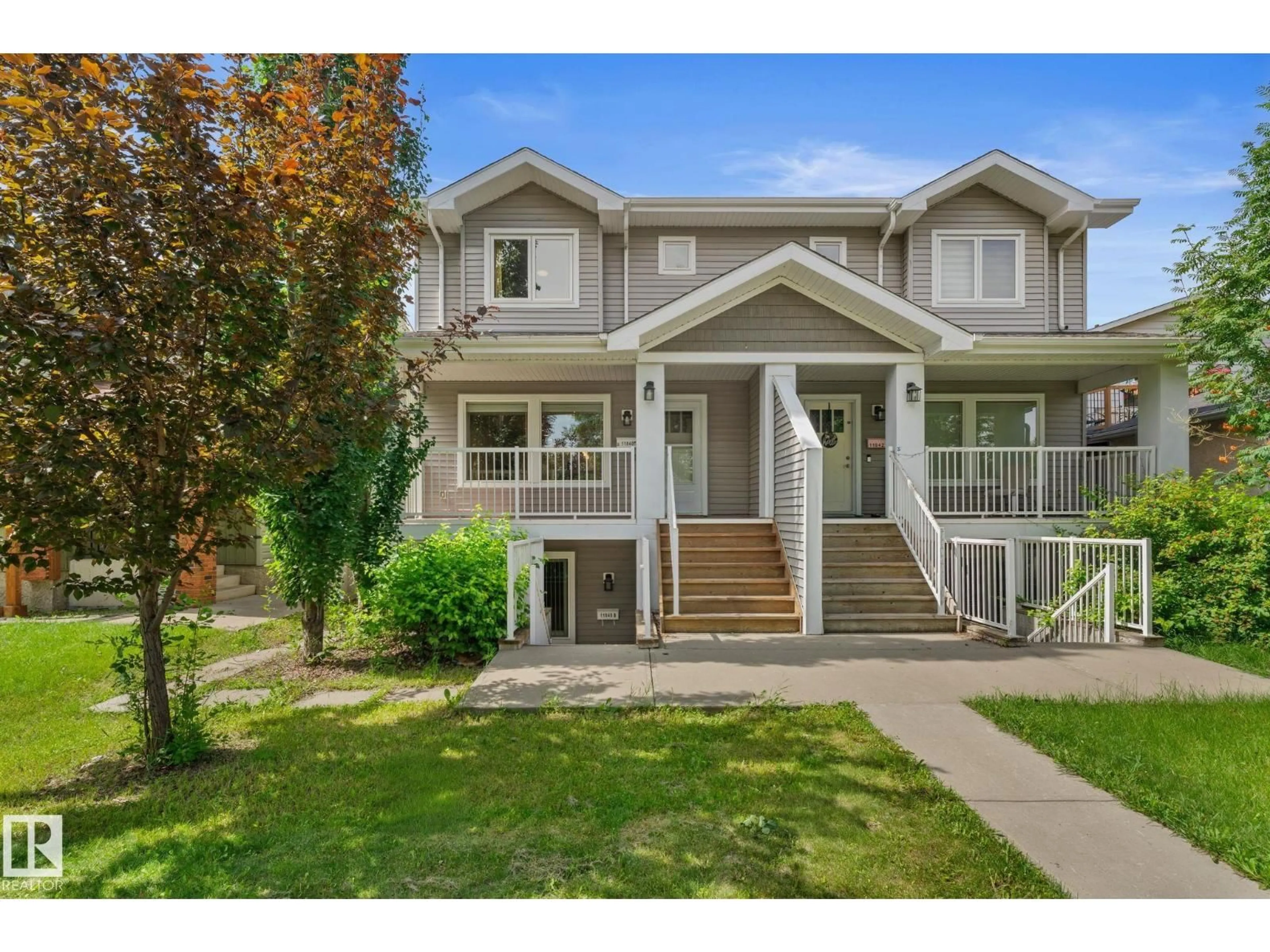 Home with vinyl exterior material, street for 11840 122 ST, Edmonton Alberta T5L0C2