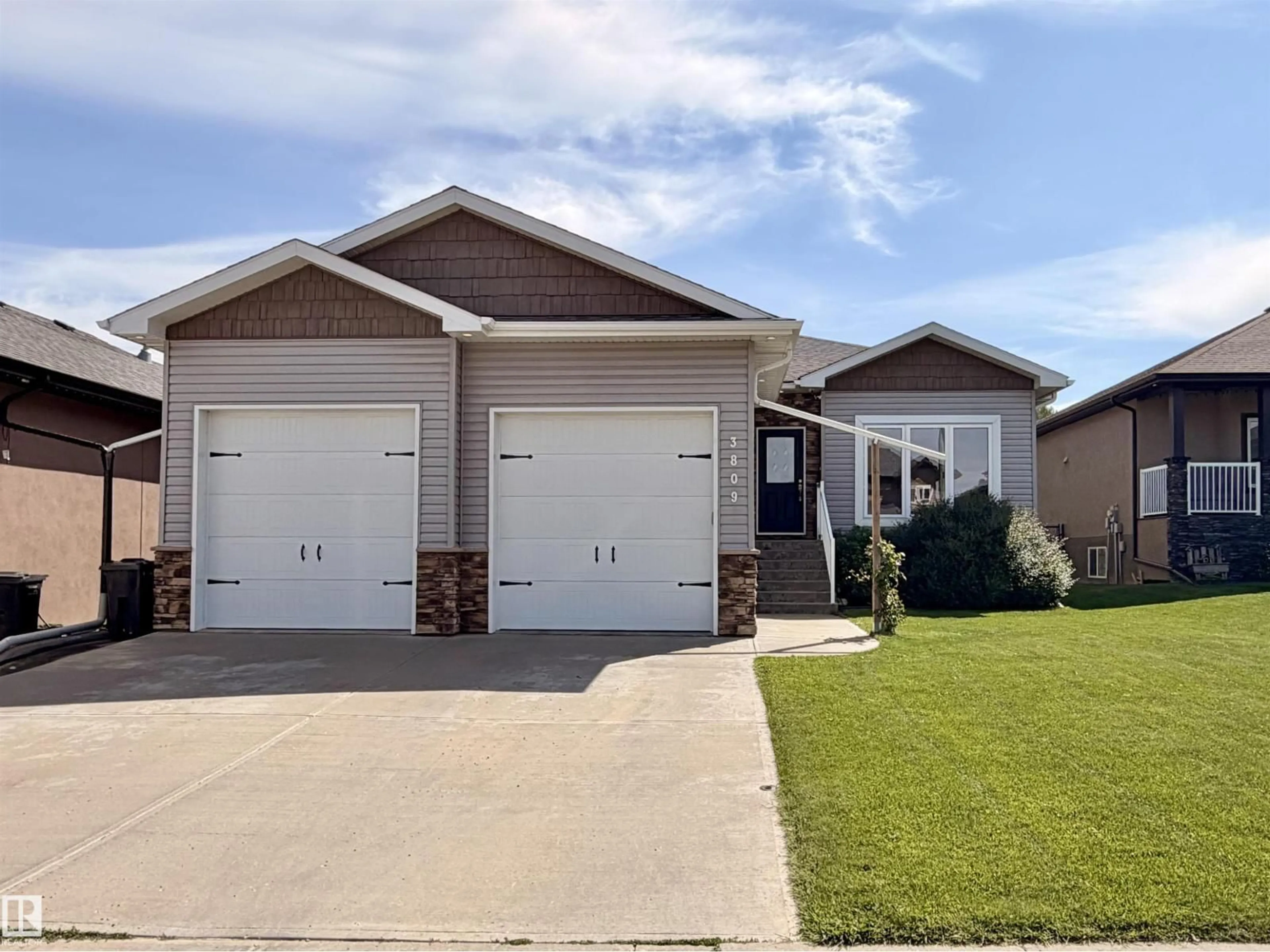 Home with vinyl exterior material, street for 3809 52 AV, Drayton Valley Alberta T7A1T7
