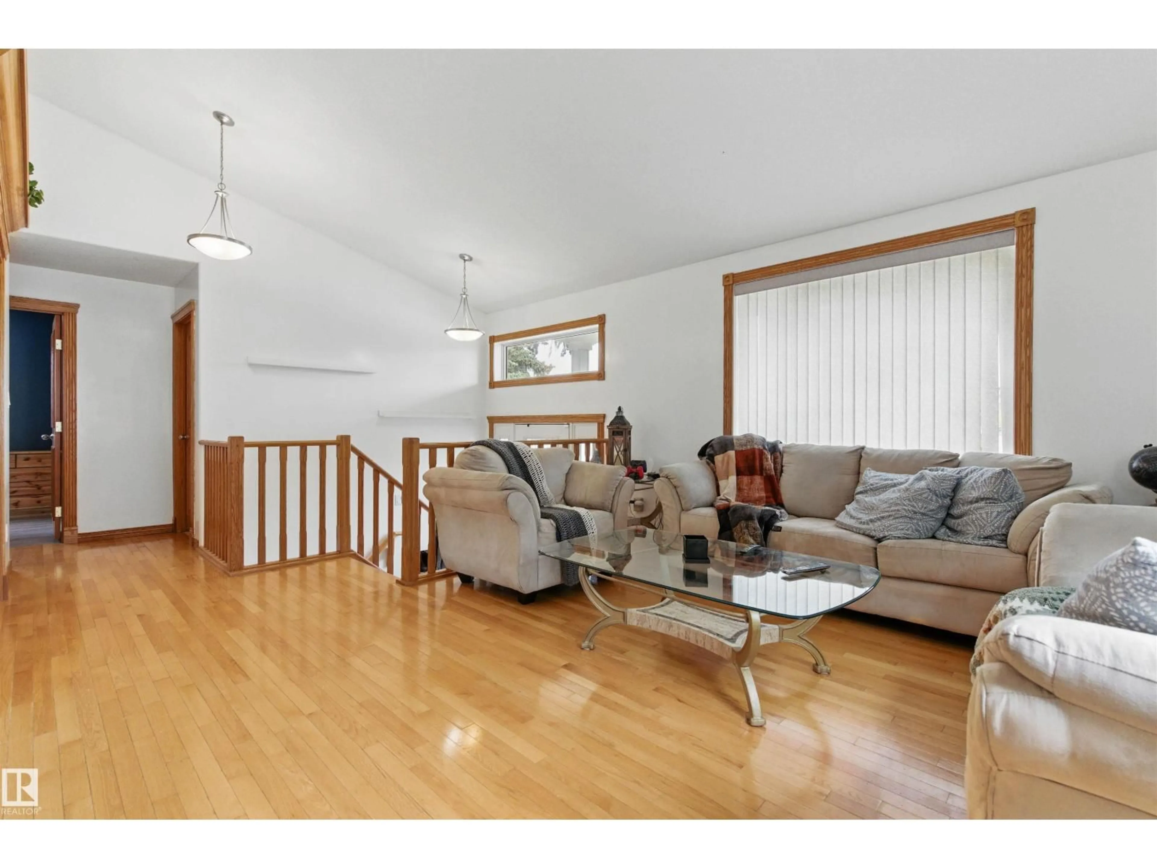 Living room with furniture, wood/laminate floor for NW - 9716 160 ST, Edmonton Alberta T5P3C8
