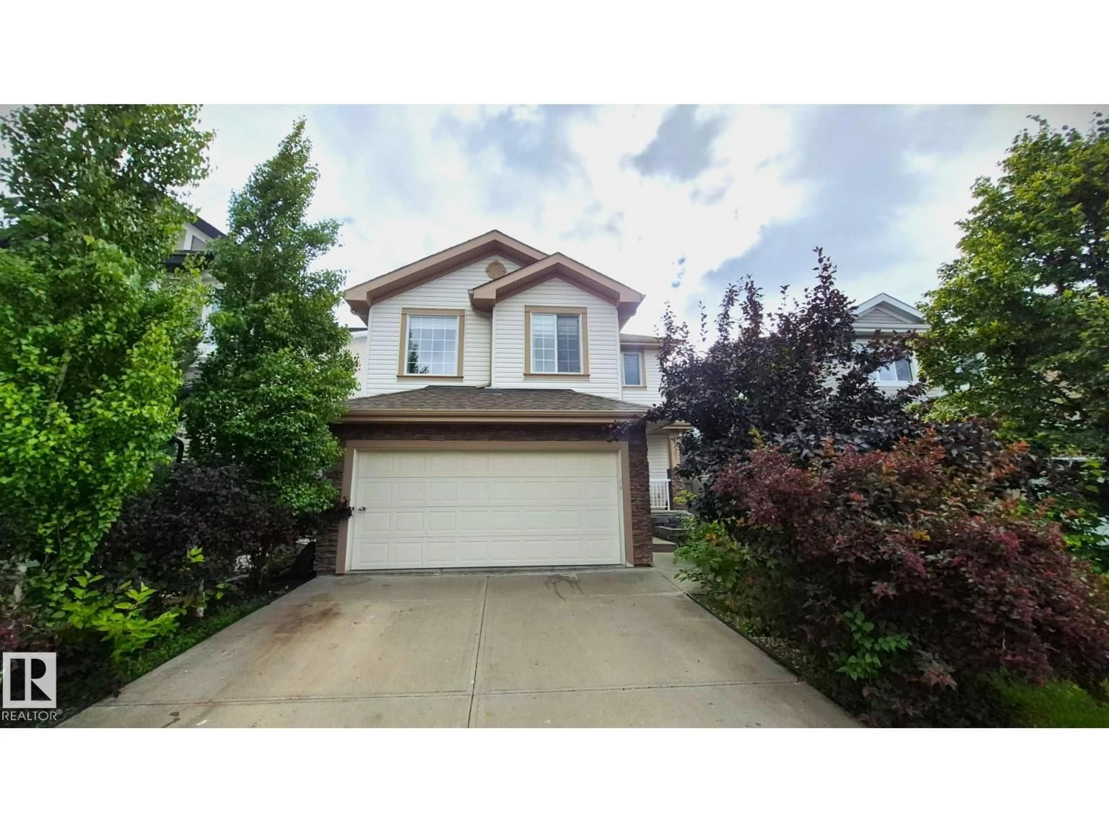 Home with vinyl exterior material, street for 131 57 ST, Edmonton Alberta T6X0K9