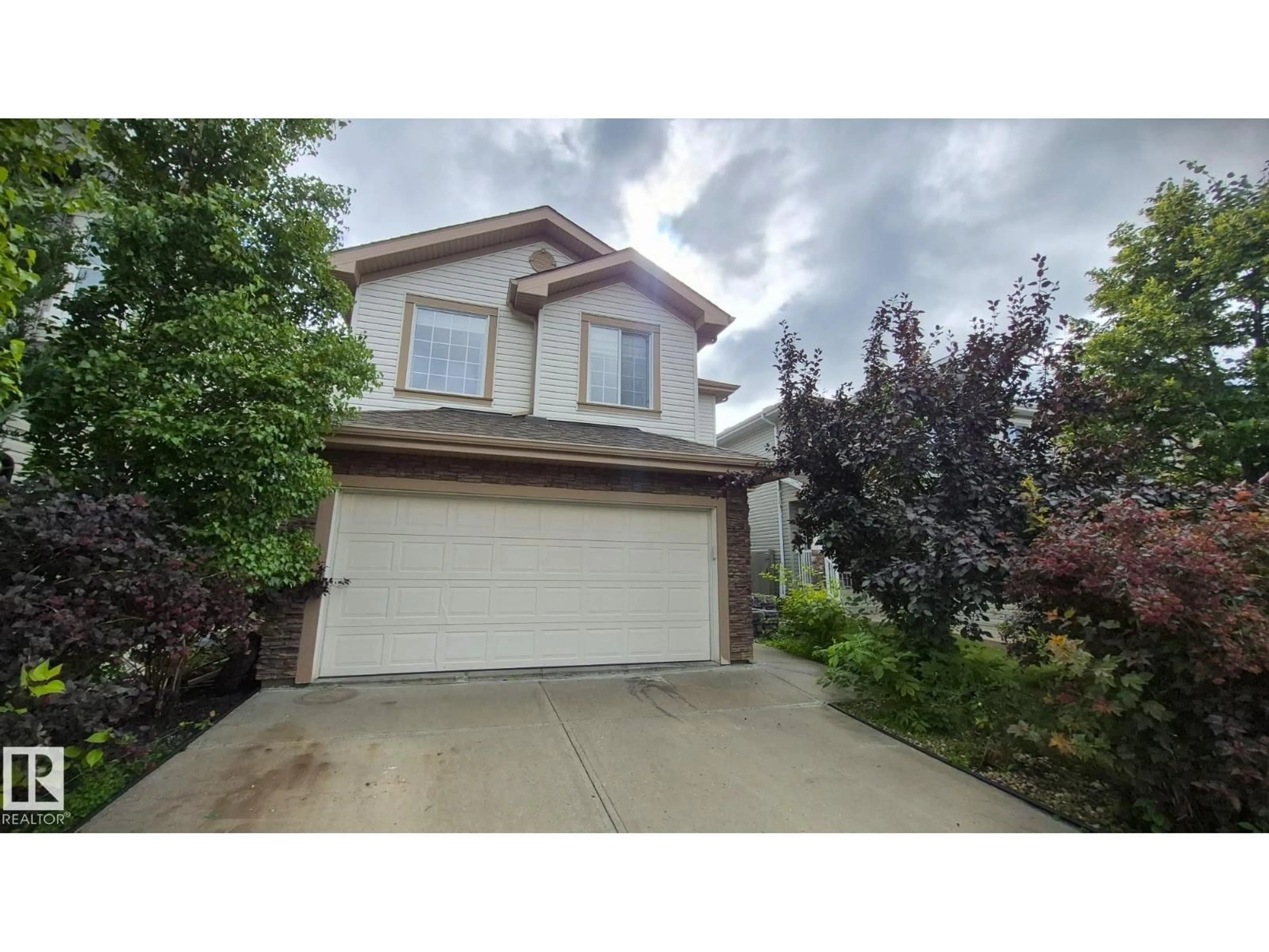 Home with vinyl exterior material, street for 131 57 ST, Edmonton Alberta T6X0K9