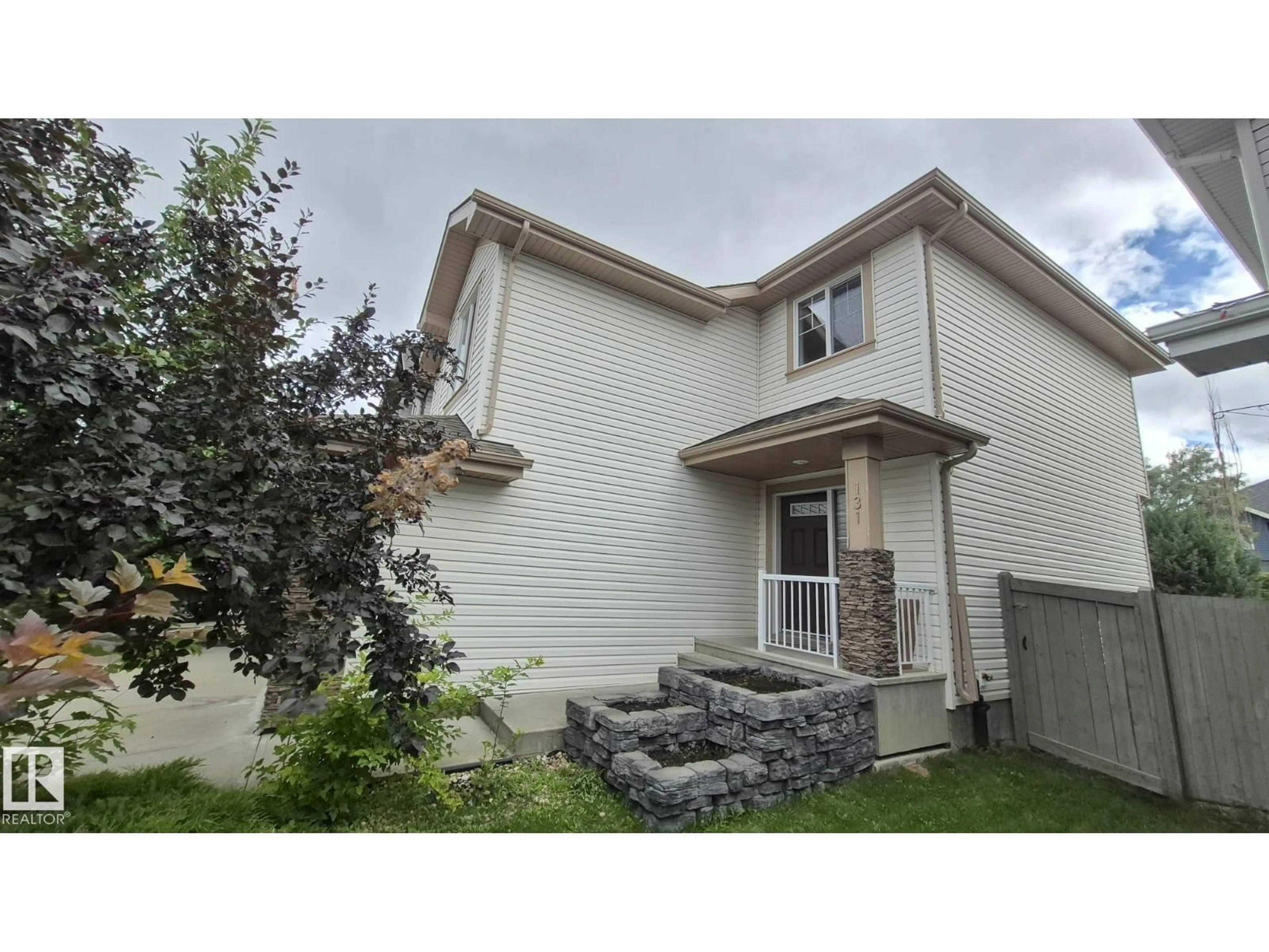 Home with vinyl exterior material, street for 131 57 ST, Edmonton Alberta T6X0K9