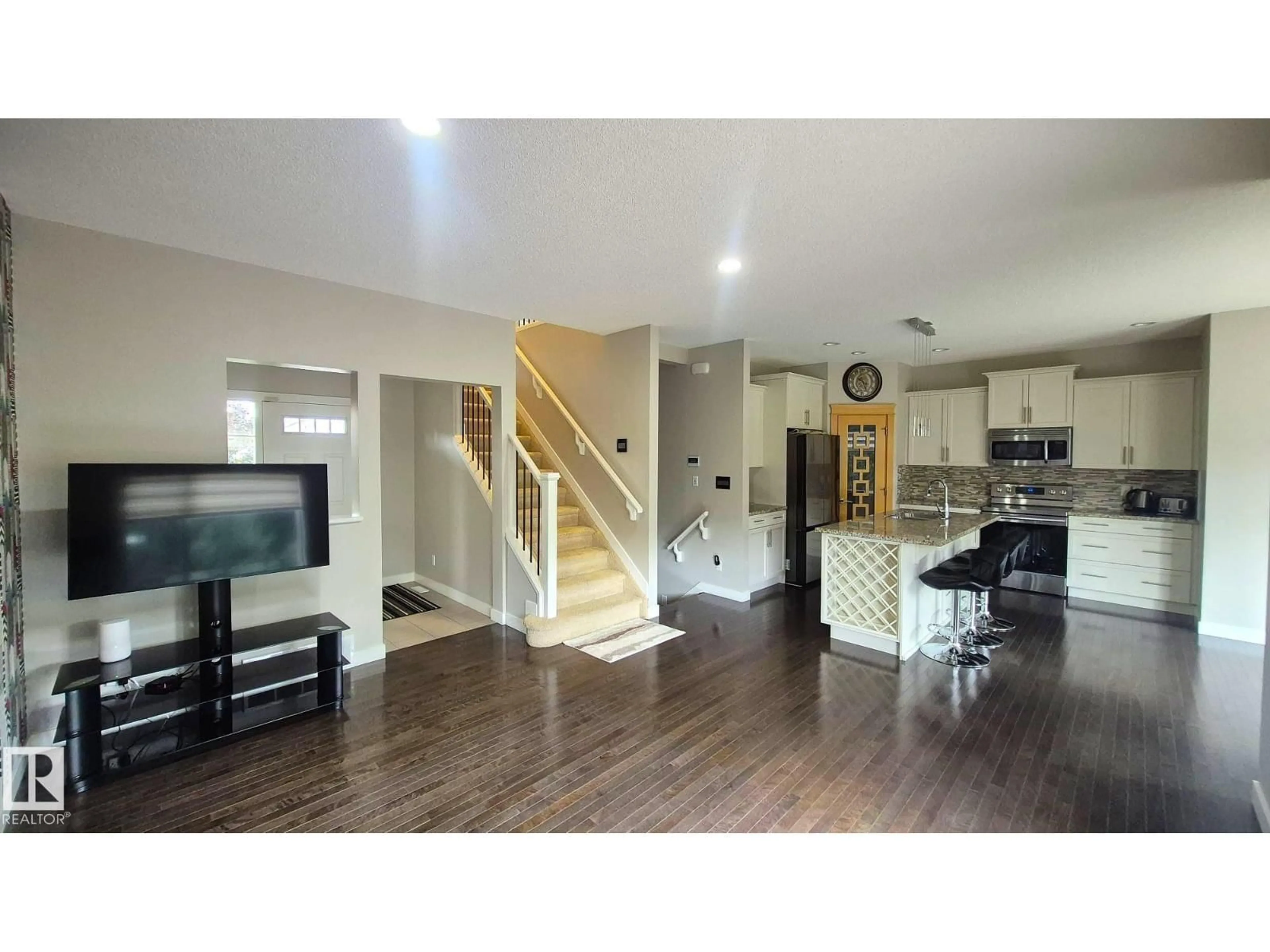 Open concept kitchen, wood/laminate floor for 131 57 ST, Edmonton Alberta T6X0K9