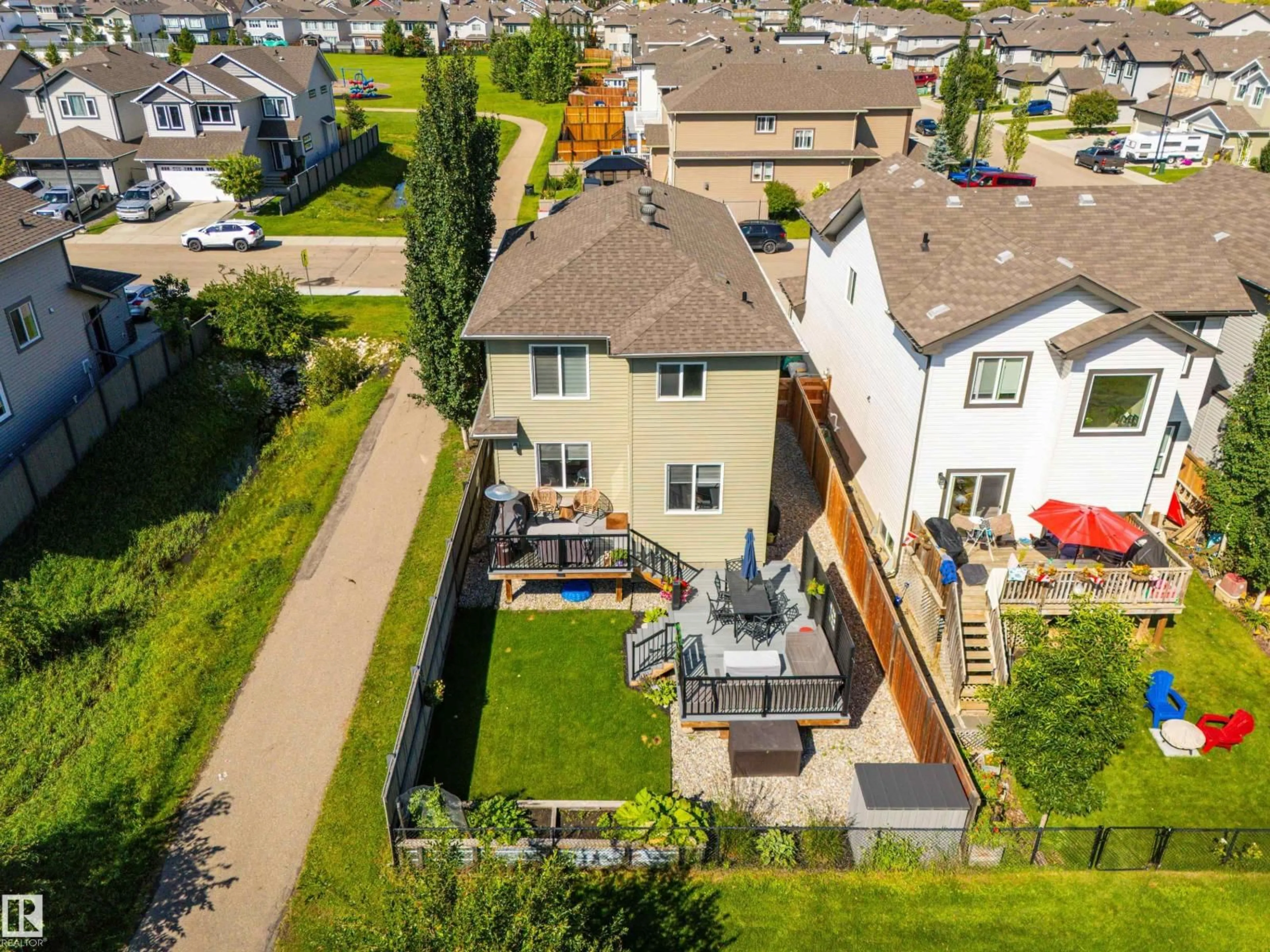 A pic from outside/outdoor area/front of a property/back of a property/a pic from drone, street for 1757 WESTERRA LO, Stony Plain Alberta T7Z0K9