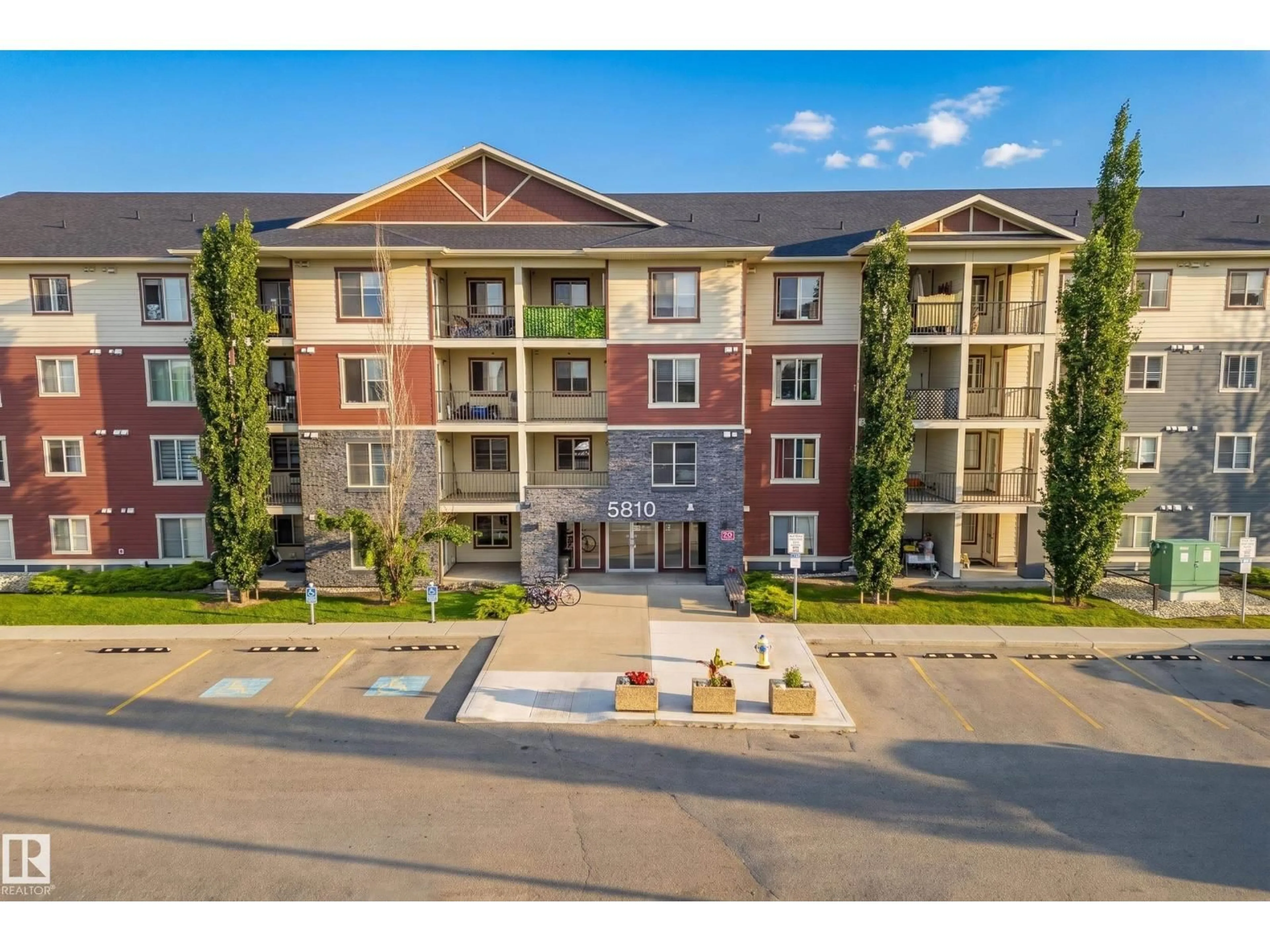 A pic from outside/outdoor area/front of a property/back of a property/a pic from drone, unknown for 222 - 5810 MULLEN PL, Edmonton Alberta T6R0W3