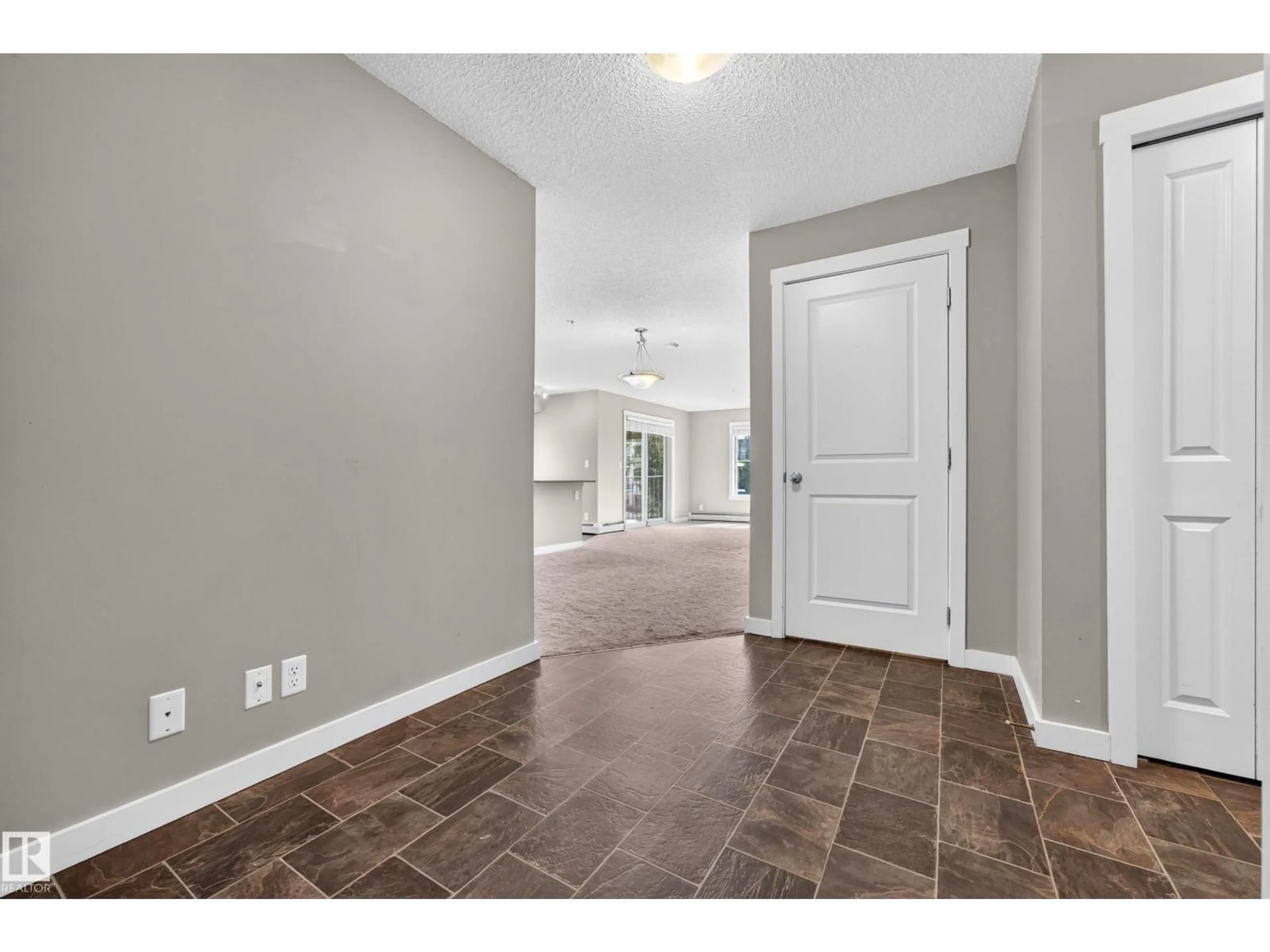 Indoor entryway for 222 - 5810 MULLEN PL, Edmonton Alberta T6R0W3