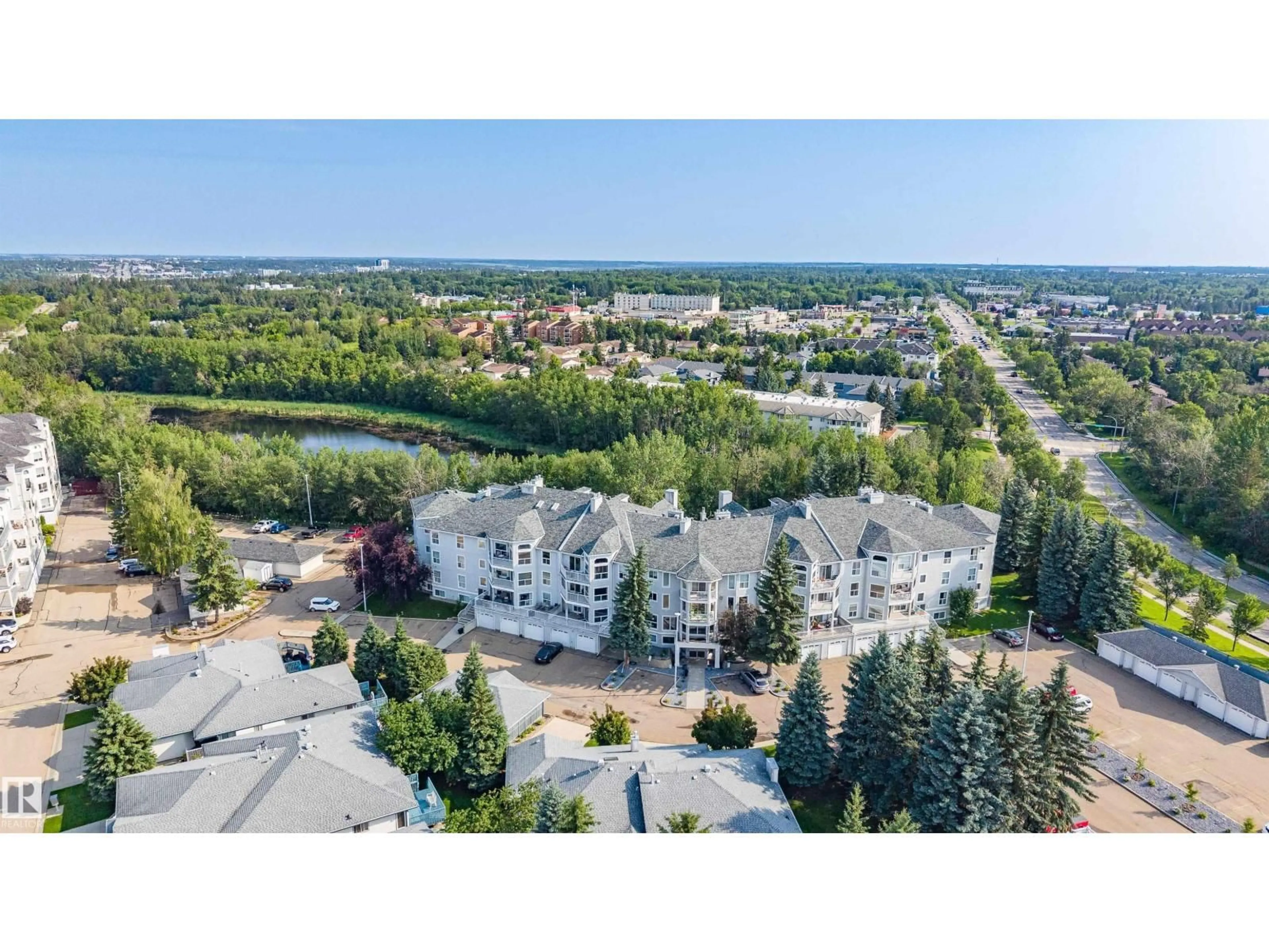 A pic from outside/outdoor area/front of a property/back of a property/a pic from drone, water/lake/river/ocean view for #209 - 209 GERVAIS RD, St. Albert Alberta T8N6H6