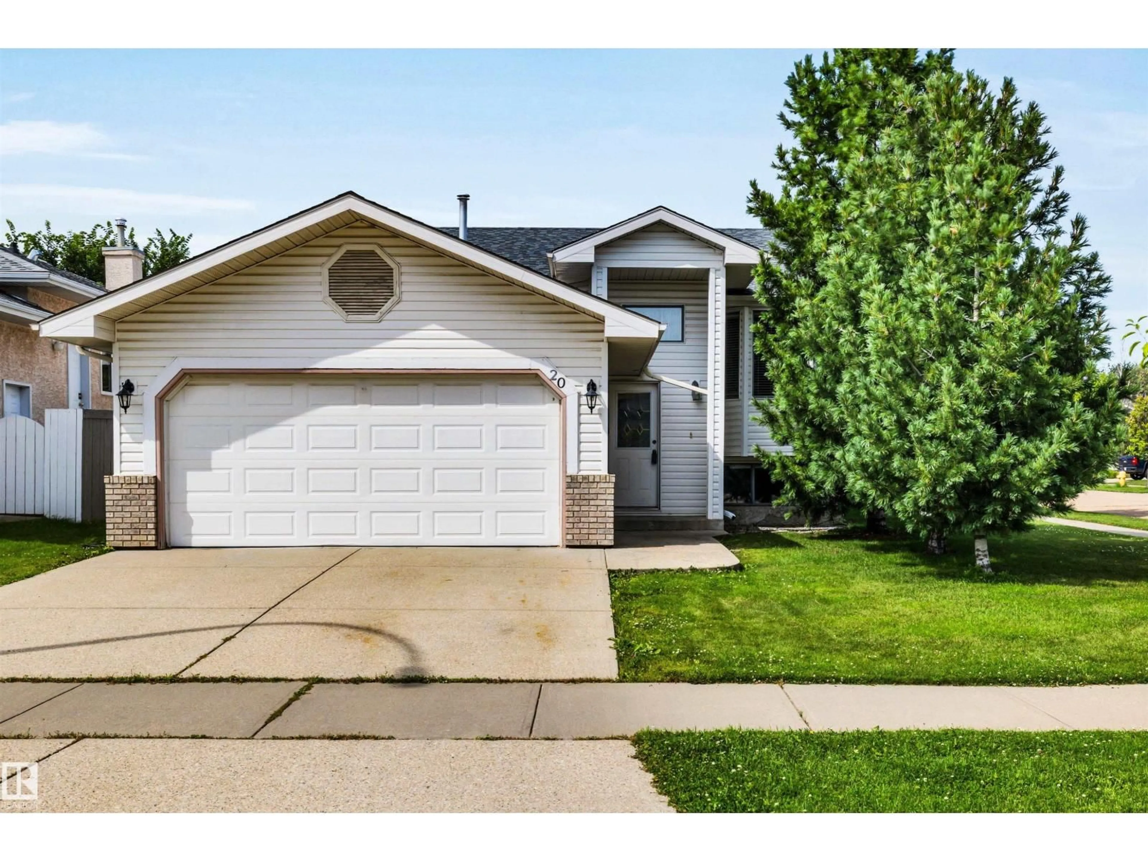 Home with vinyl exterior material, street for 20 HIGHLAND CR, St. Albert Alberta T8N6K1