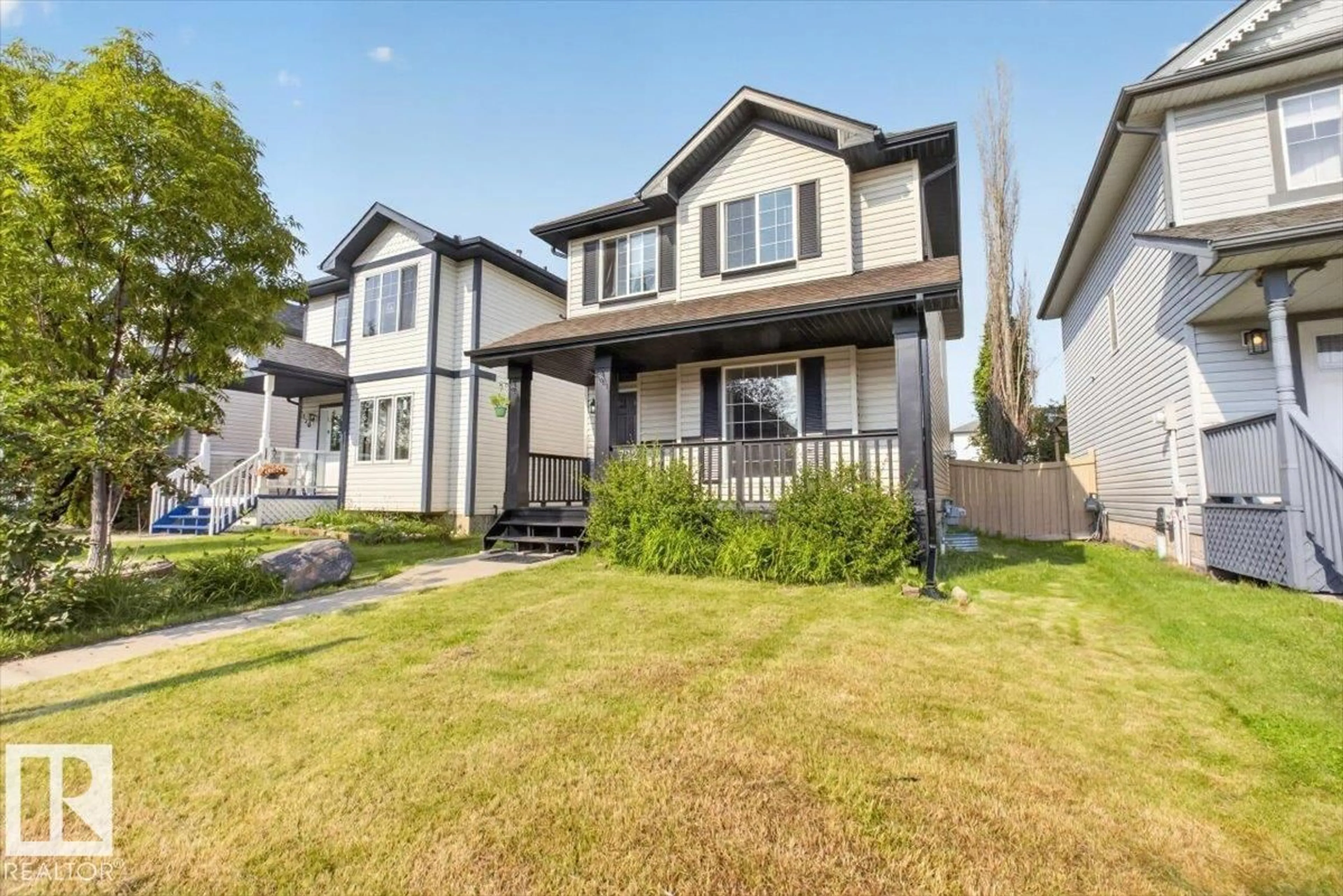 Home with vinyl exterior material, street for 722 88A ST, Edmonton Alberta T6X1C4