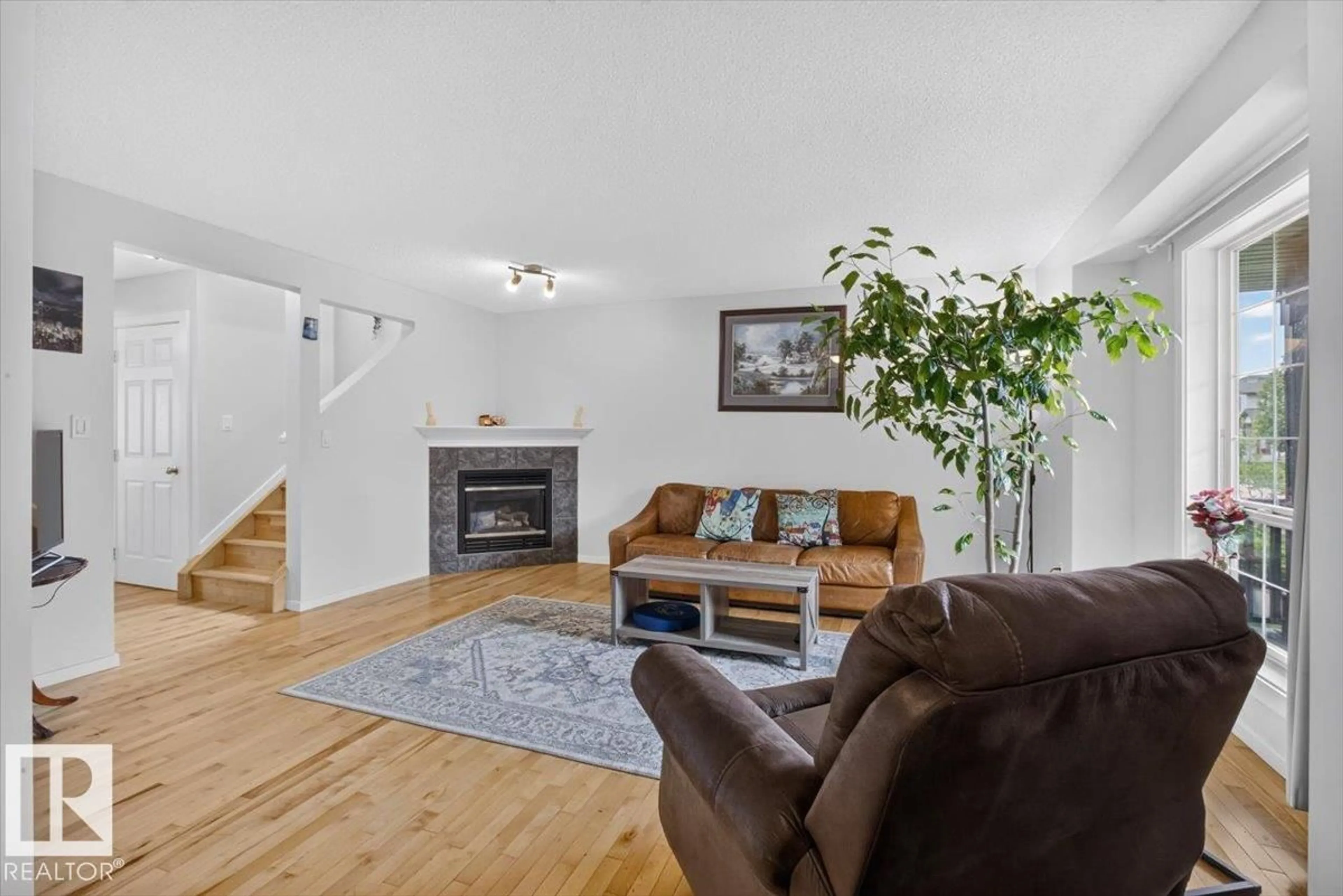 Living room with furniture, unknown for 722 88A ST, Edmonton Alberta T6X1C4