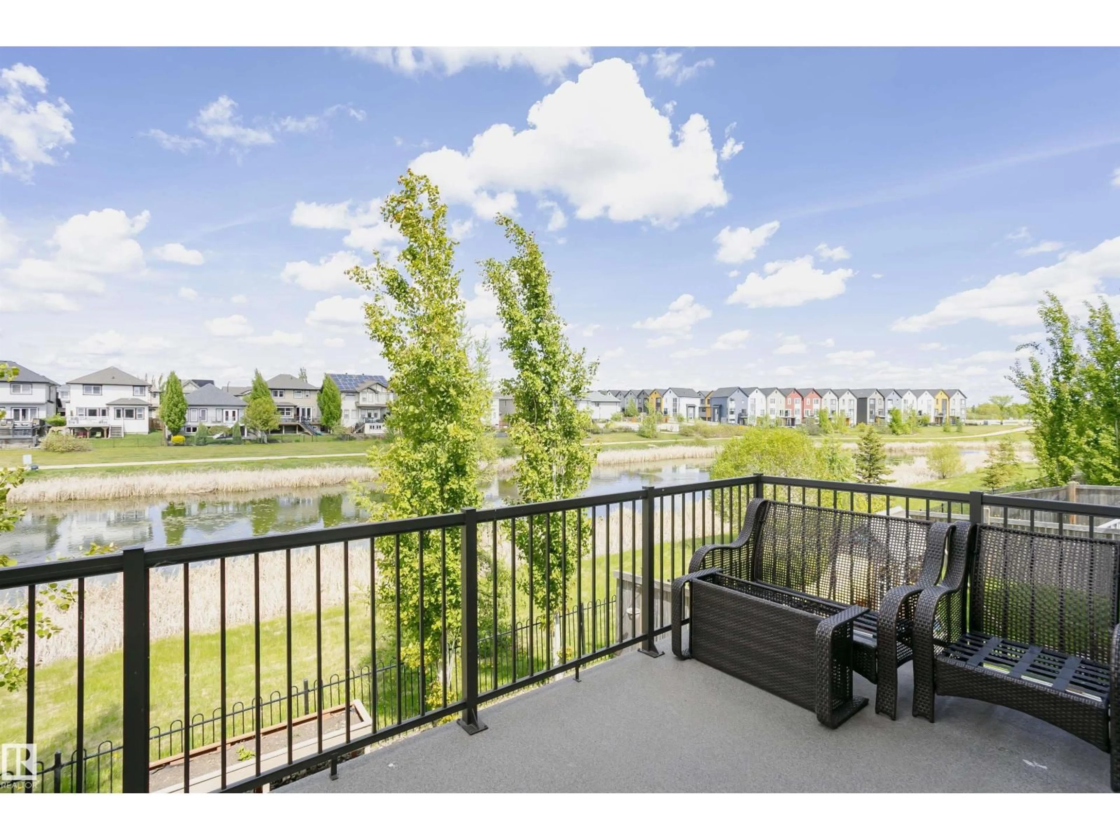 Patio, water/lake/river/ocean view for SW - 15848 13 AV, Edmonton Alberta T6W2N5