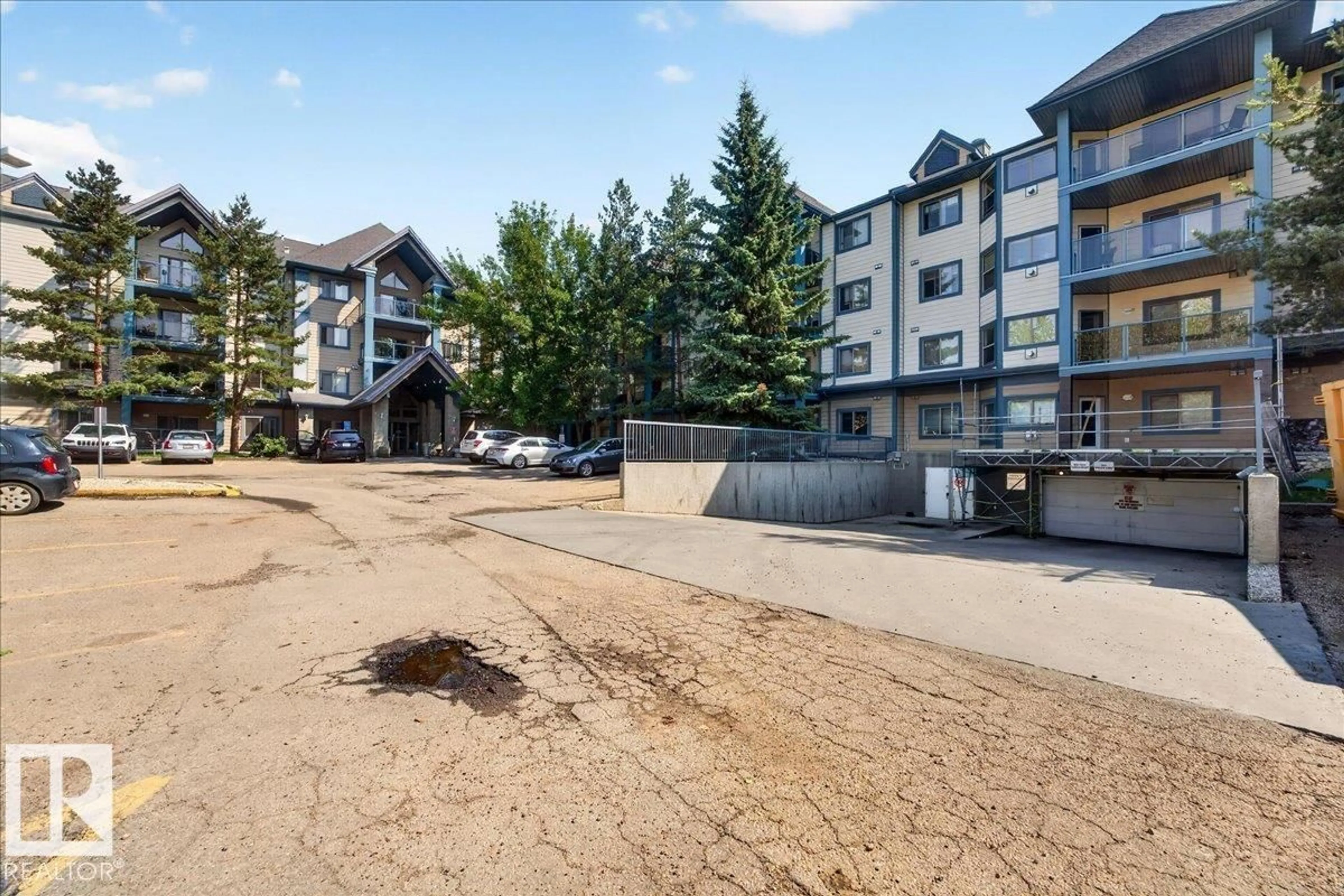 A pic from outside/outdoor area/front of a property/back of a property/a pic from drone, unknown for 2903 - 122 RABBIT HILL RD, Edmonton Alberta T6R3A3