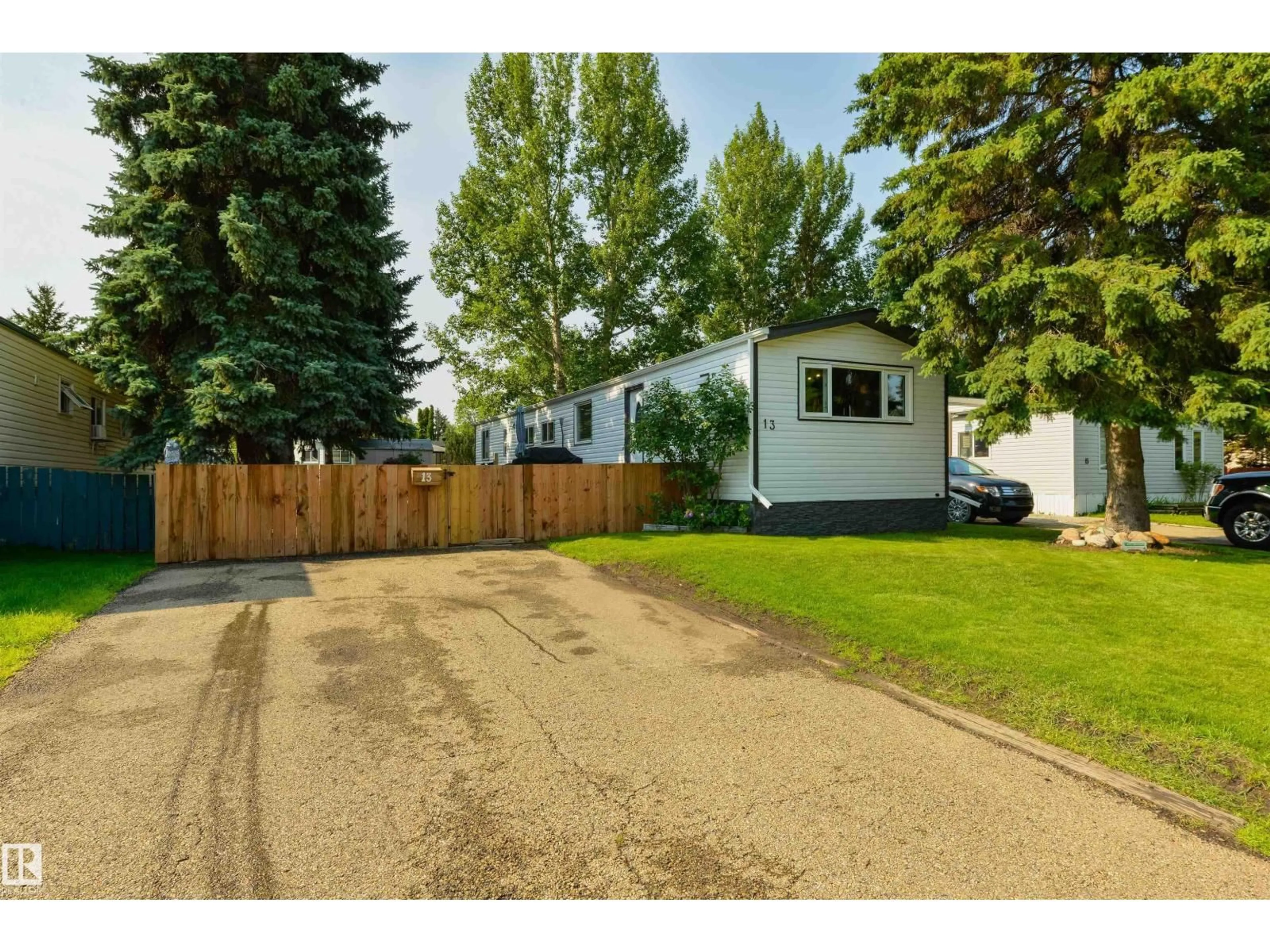 A pic from outside/outdoor area/front of a property/back of a property/a pic from drone, street for 13 THE PARKWAY NW, Edmonton Alberta T6P1C8