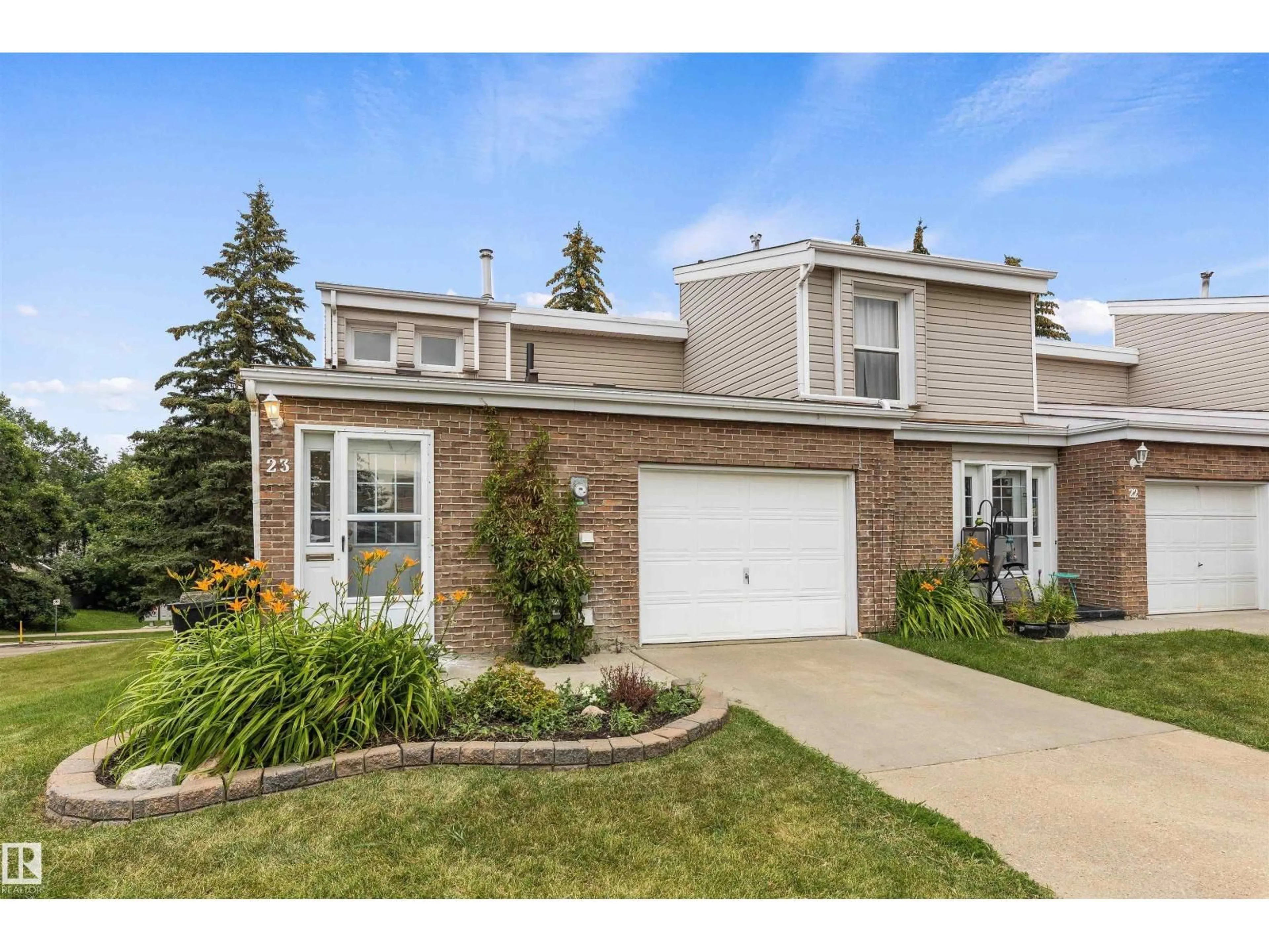 Home with brick exterior material, street for 23 GRANDVIEW RG, St. Albert Alberta T8N1T3