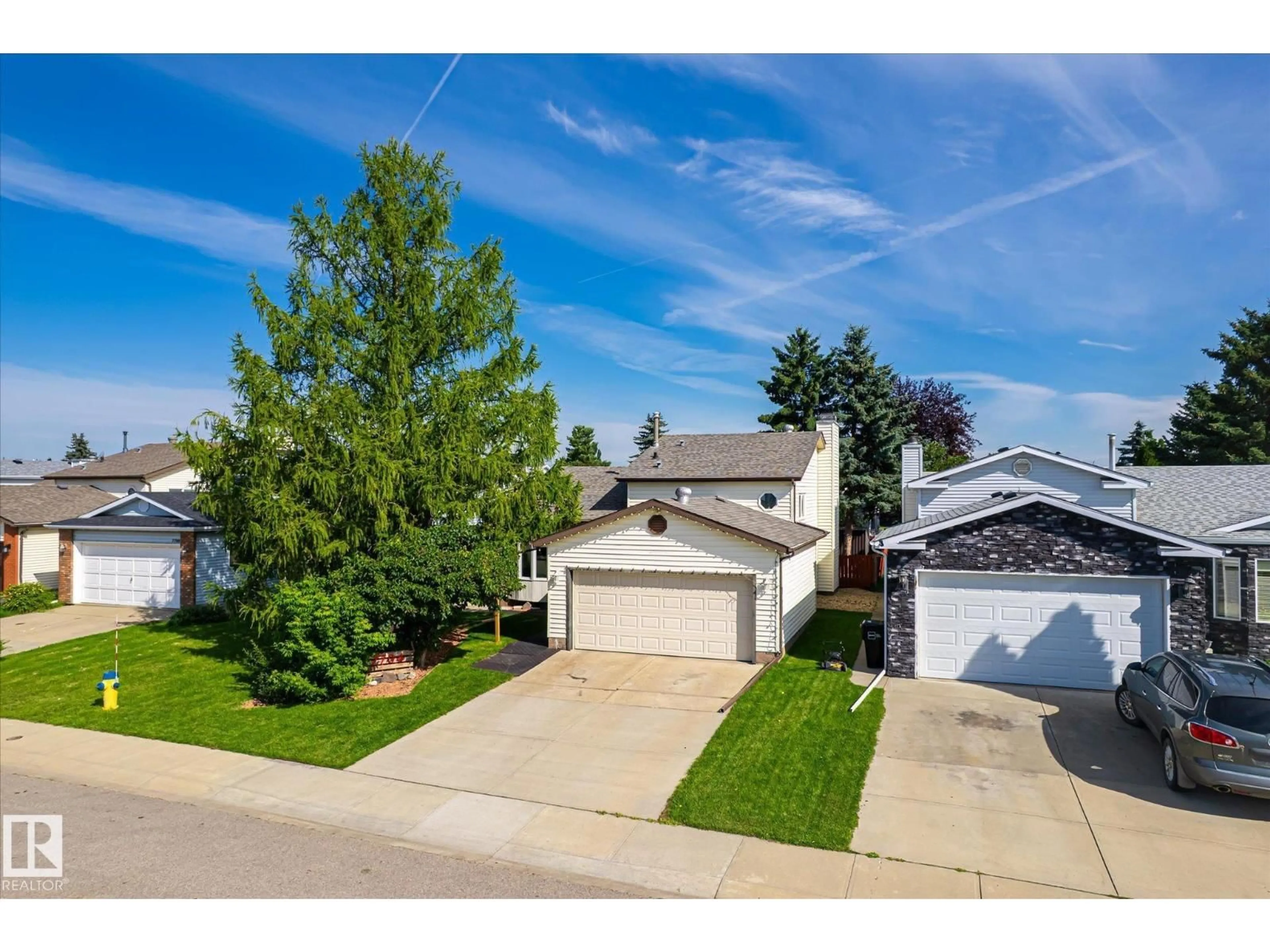 A pic from outside/outdoor area/front of a property/back of a property/a pic from drone, street for NW - 7704 152B AV, Edmonton Alberta T5C3M5