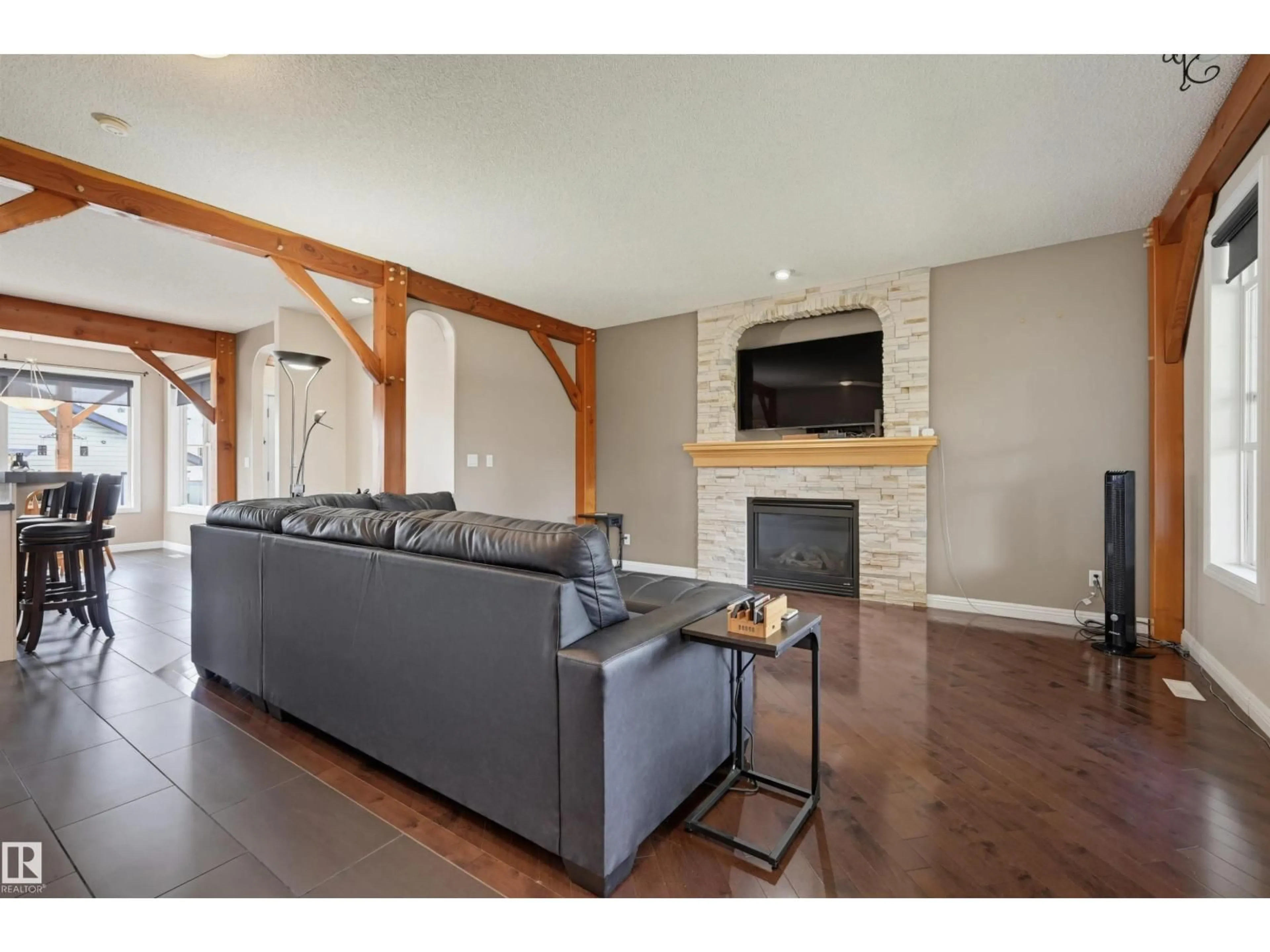 Living room with furniture, wood/laminate floor for 1846 TOWNE CENTRE BV, Edmonton Alberta T6R3B7
