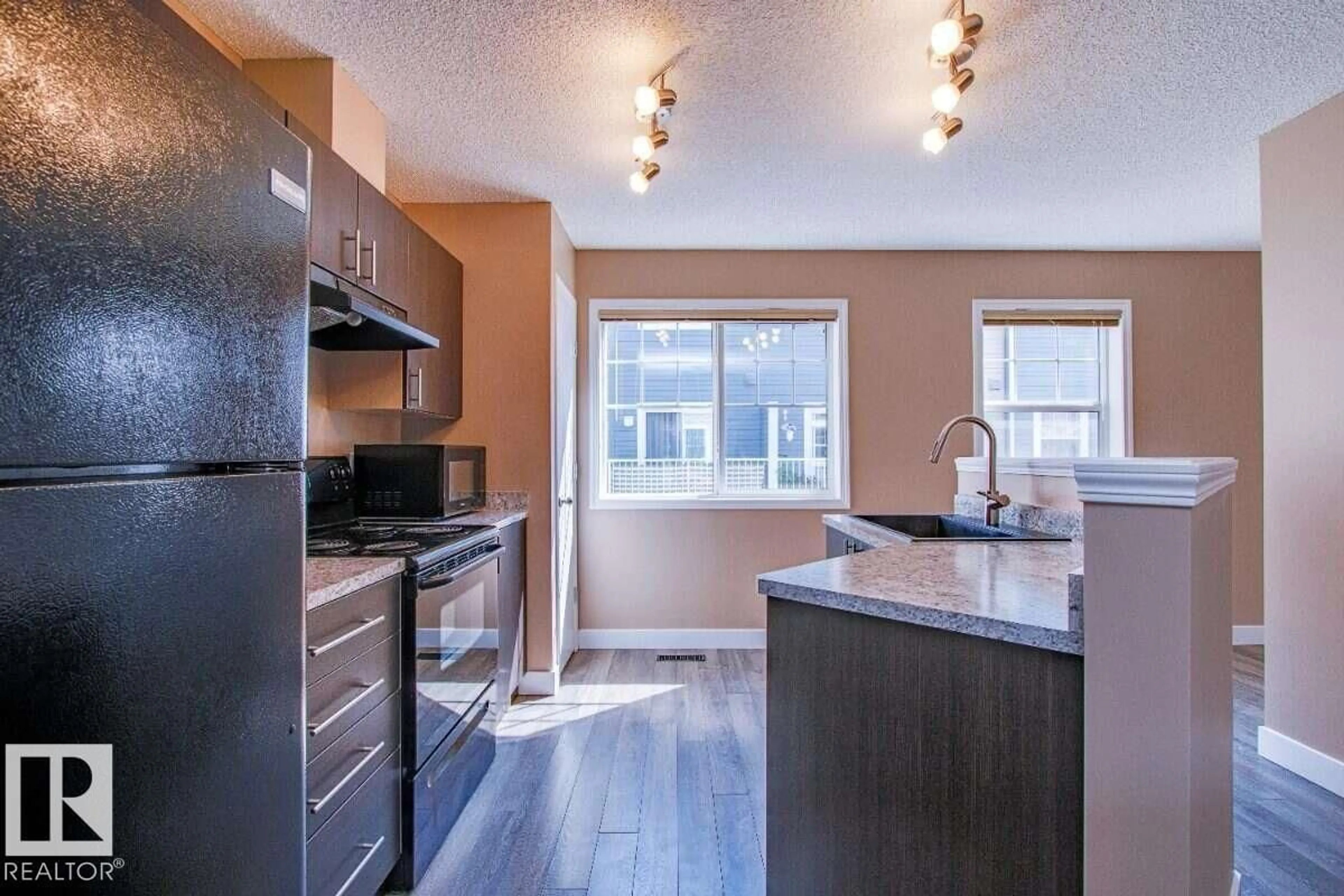 Open concept kitchen, unknown for 15 - 8304 11 AV, Edmonton Alberta T6X1J8