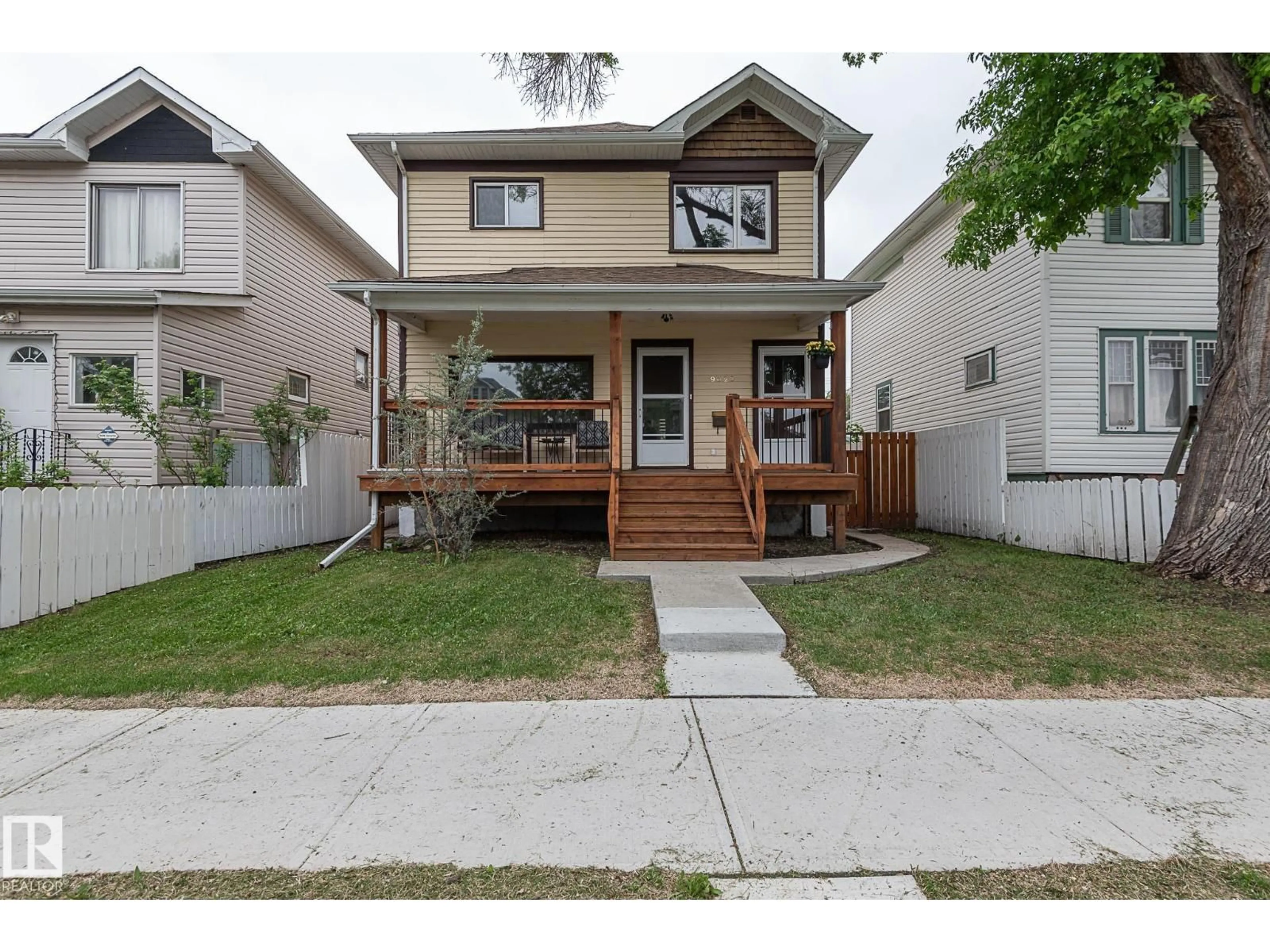 Home with vinyl exterior material, street for 9623 110A AV, Edmonton Alberta T5H1J8