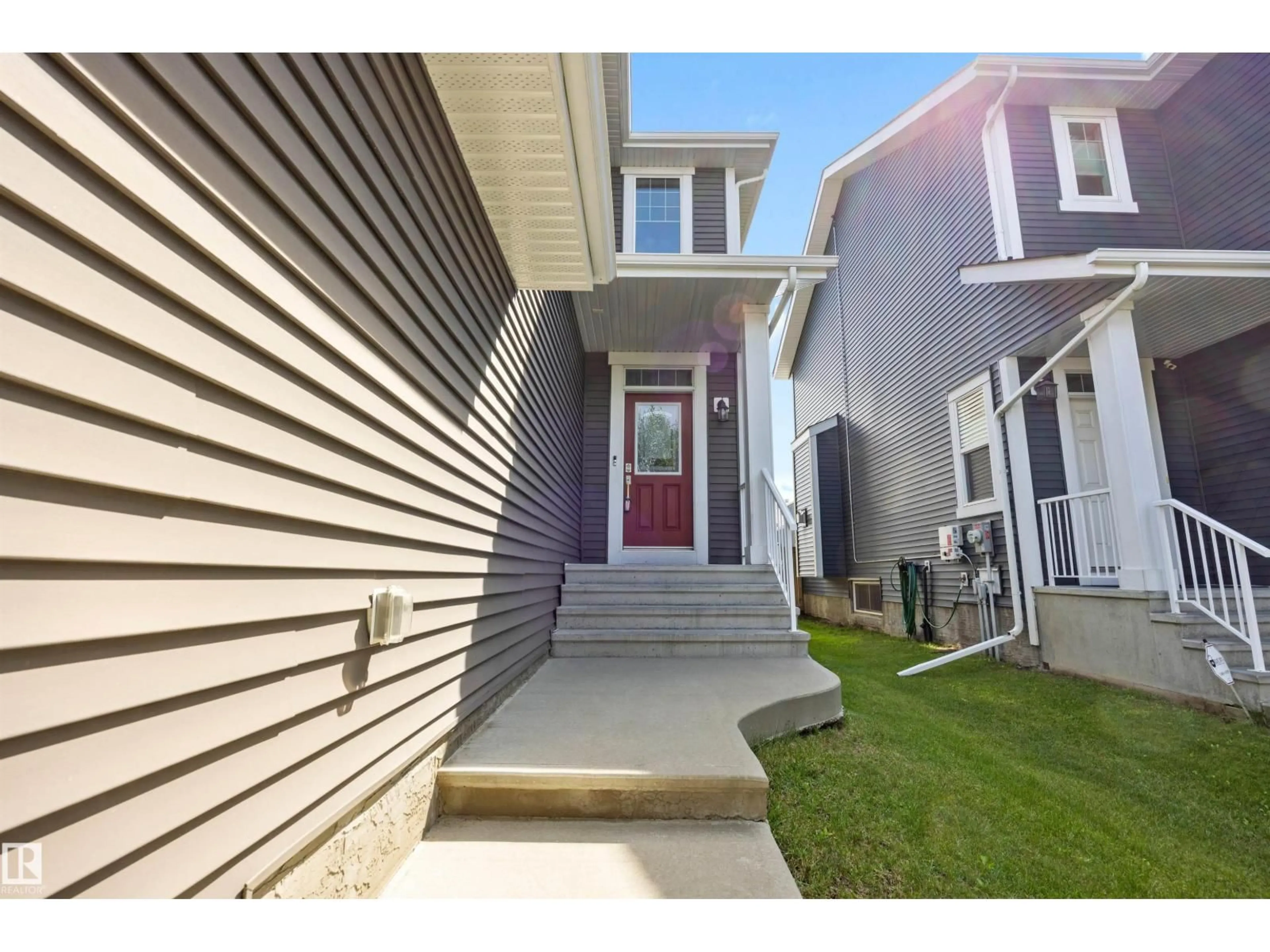 Home with vinyl exterior material, street for 93 SHEPPARD WY, Leduc Alberta T9E0T4