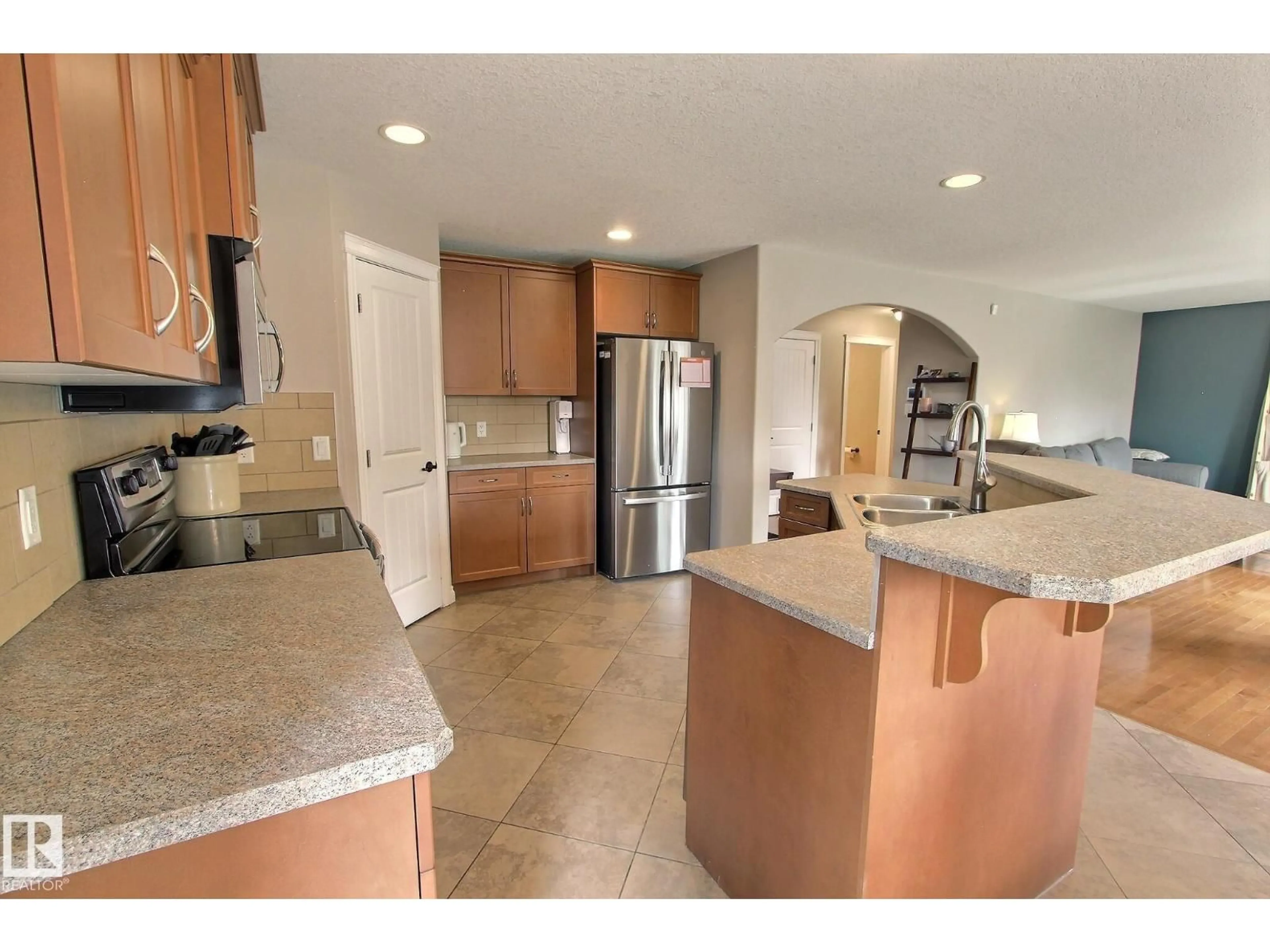 Open concept kitchen, ceramic/tile floor for 10 BIRCHMONT CR, Leduc Alberta T9E8S3