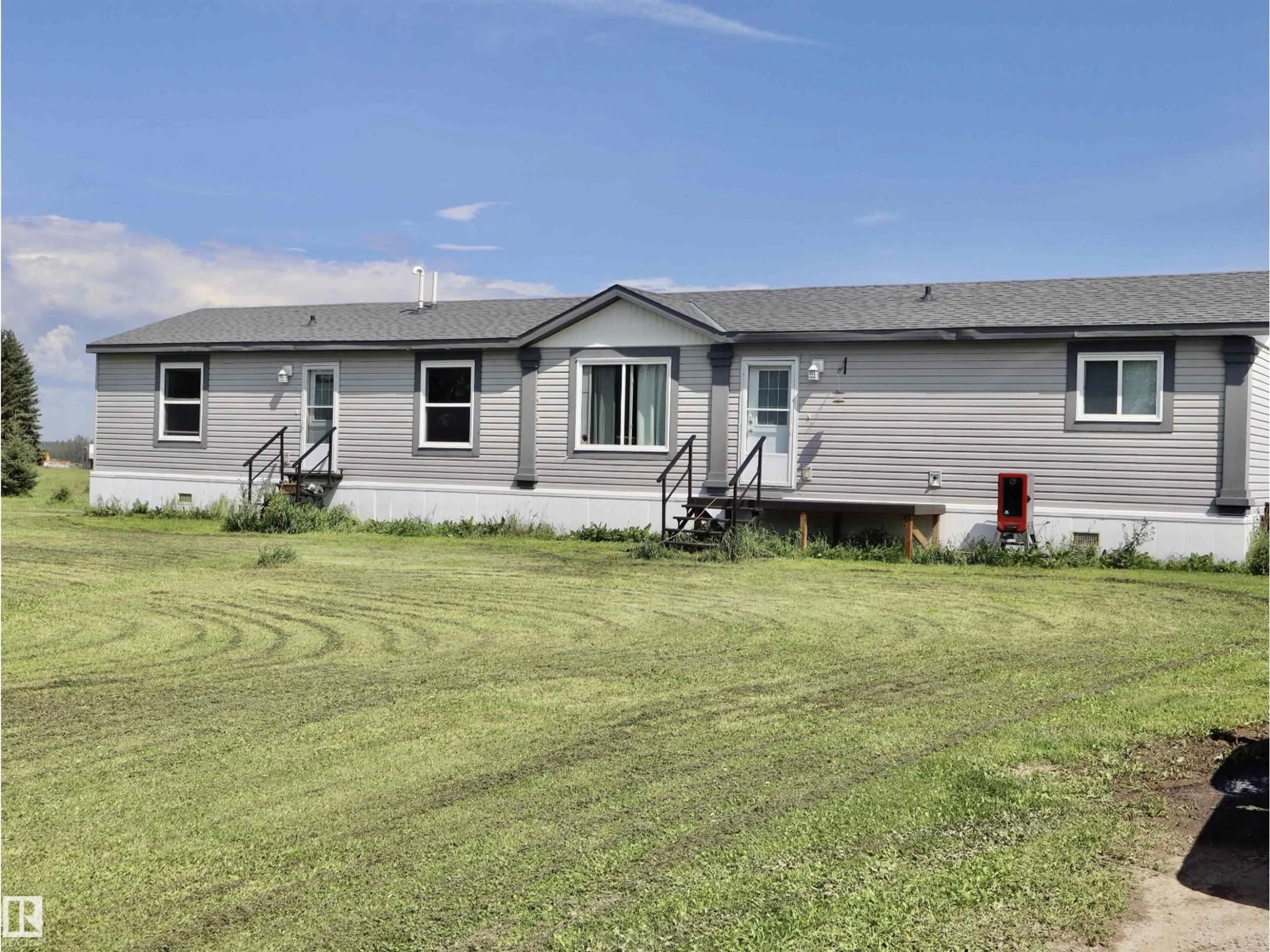 A pic from outside/outdoor area/front of a property/back of a property/a pic from drone, unknown for 59019 RGE RD 35, Rural Barrhead County Alberta T7N1N4
