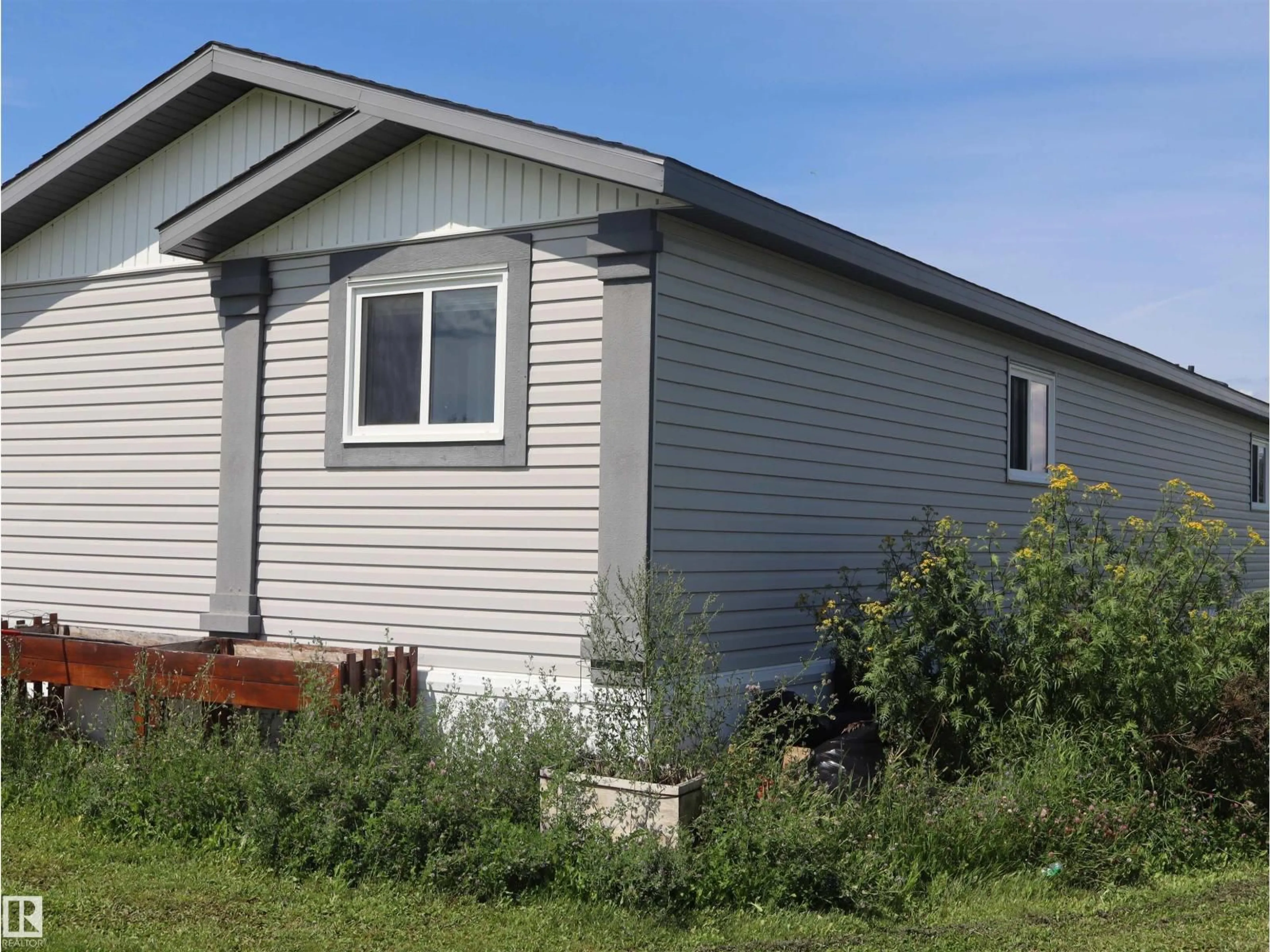 Home with vinyl exterior material, building for 59019 RGE RD 35, Rural Barrhead County Alberta T7N1N4