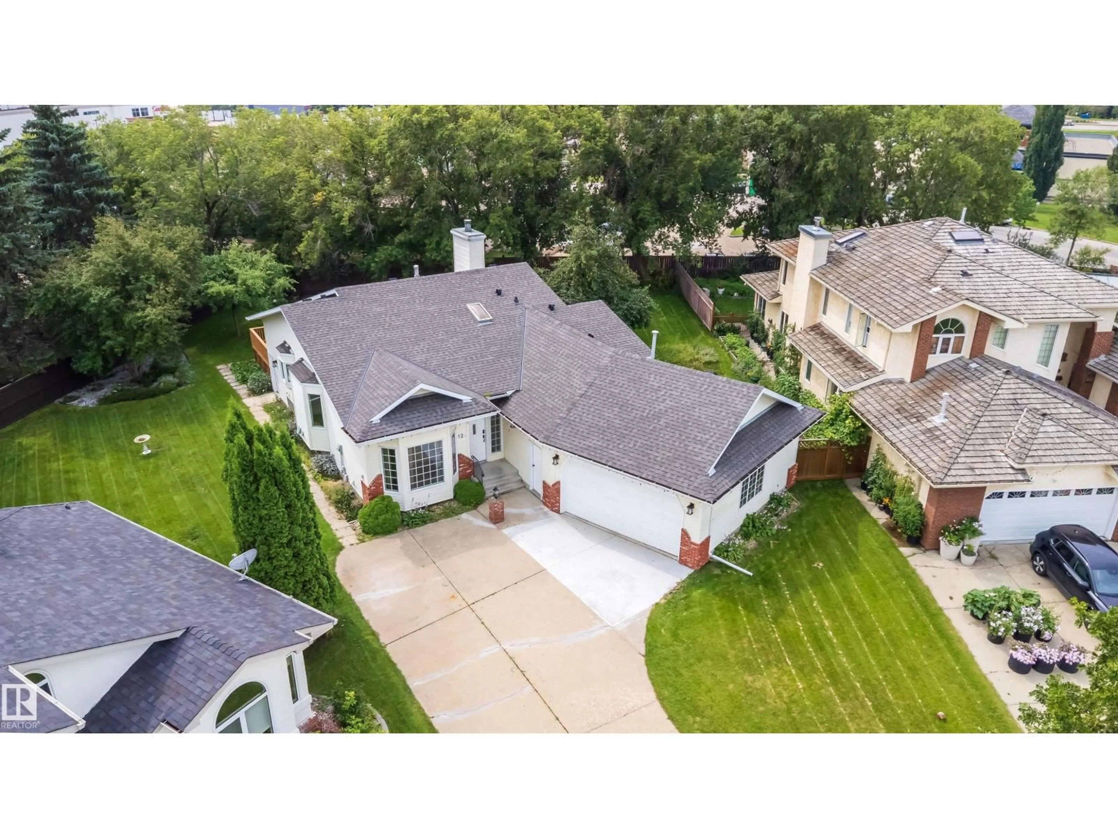 A pic from outside/outdoor area/front of a property/back of a property/a pic from drone, street for #A - 12 INVERMERE PL, St. Albert Alberta T8N5N1