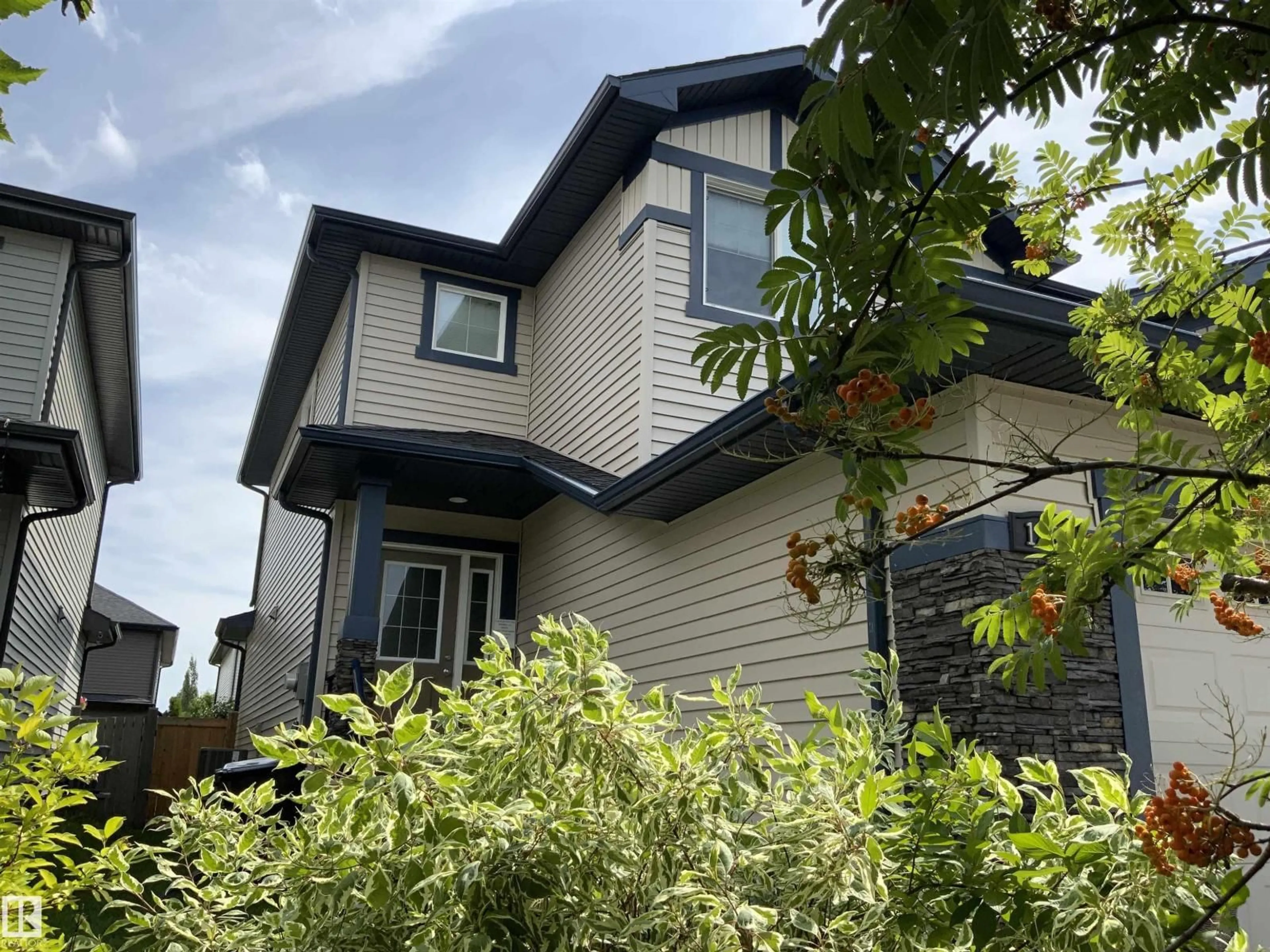 Home with vinyl exterior material, street for NW - 1203 177 ST, Edmonton Alberta T6W2J7