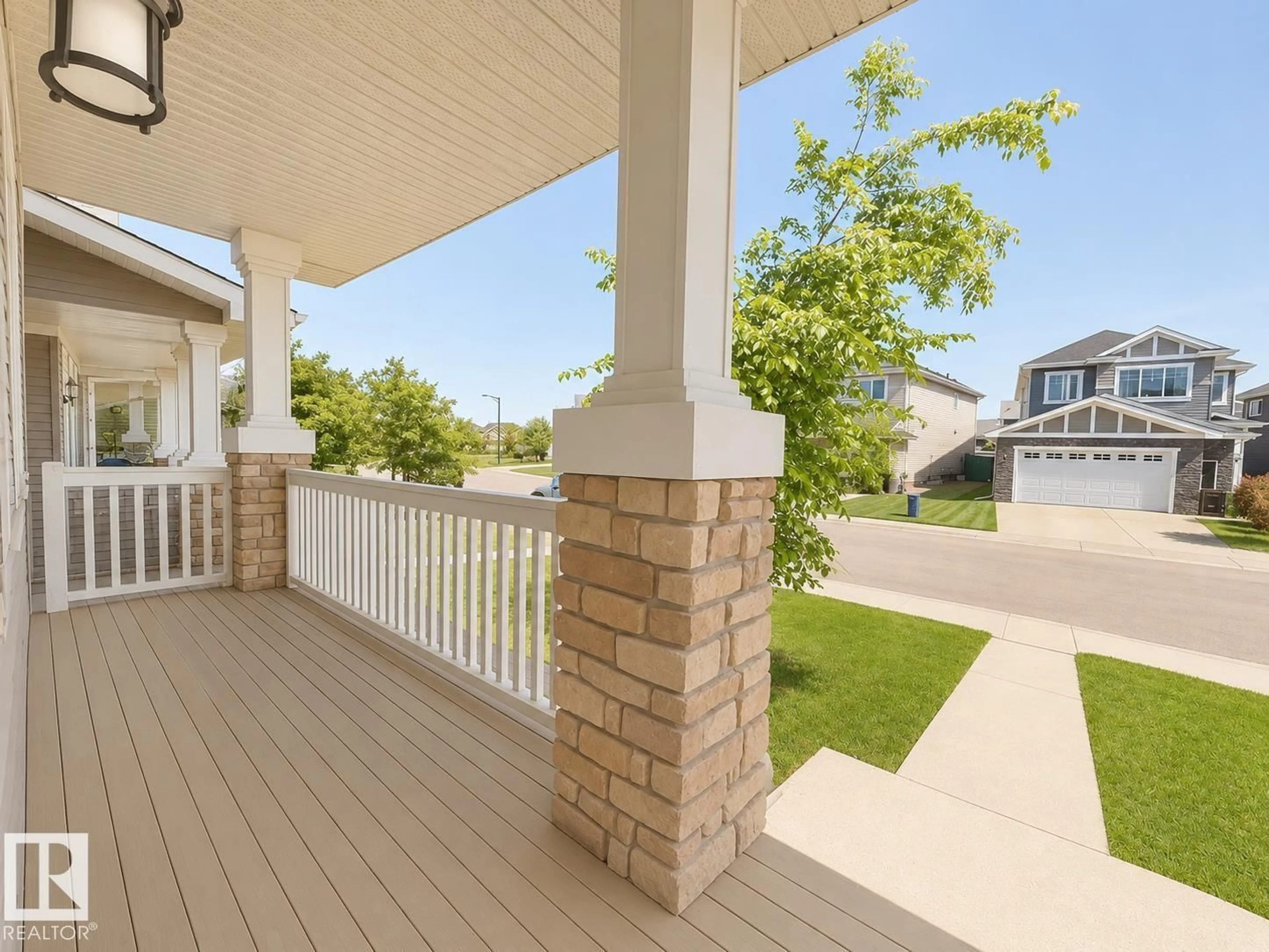 Home with vinyl exterior material, street for 16464 15 AV, Edmonton Alberta T6W2Z7