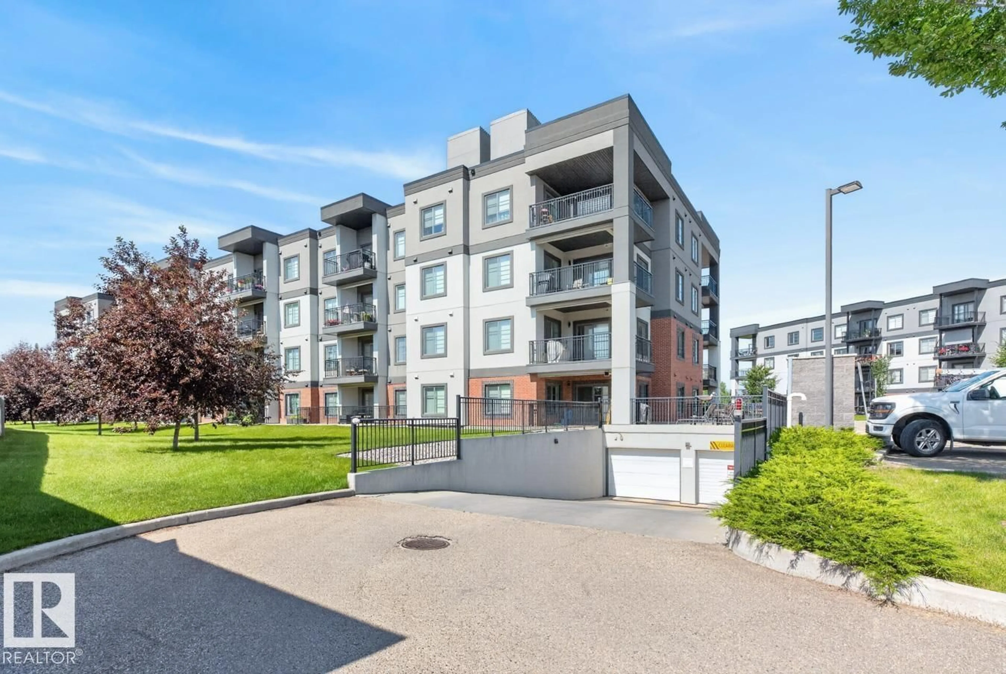 A pic from outside/outdoor area/front of a property/back of a property/a pic from drone, building for 307 - 1144 ADAMSON DR, Edmonton Alberta T6W2X7