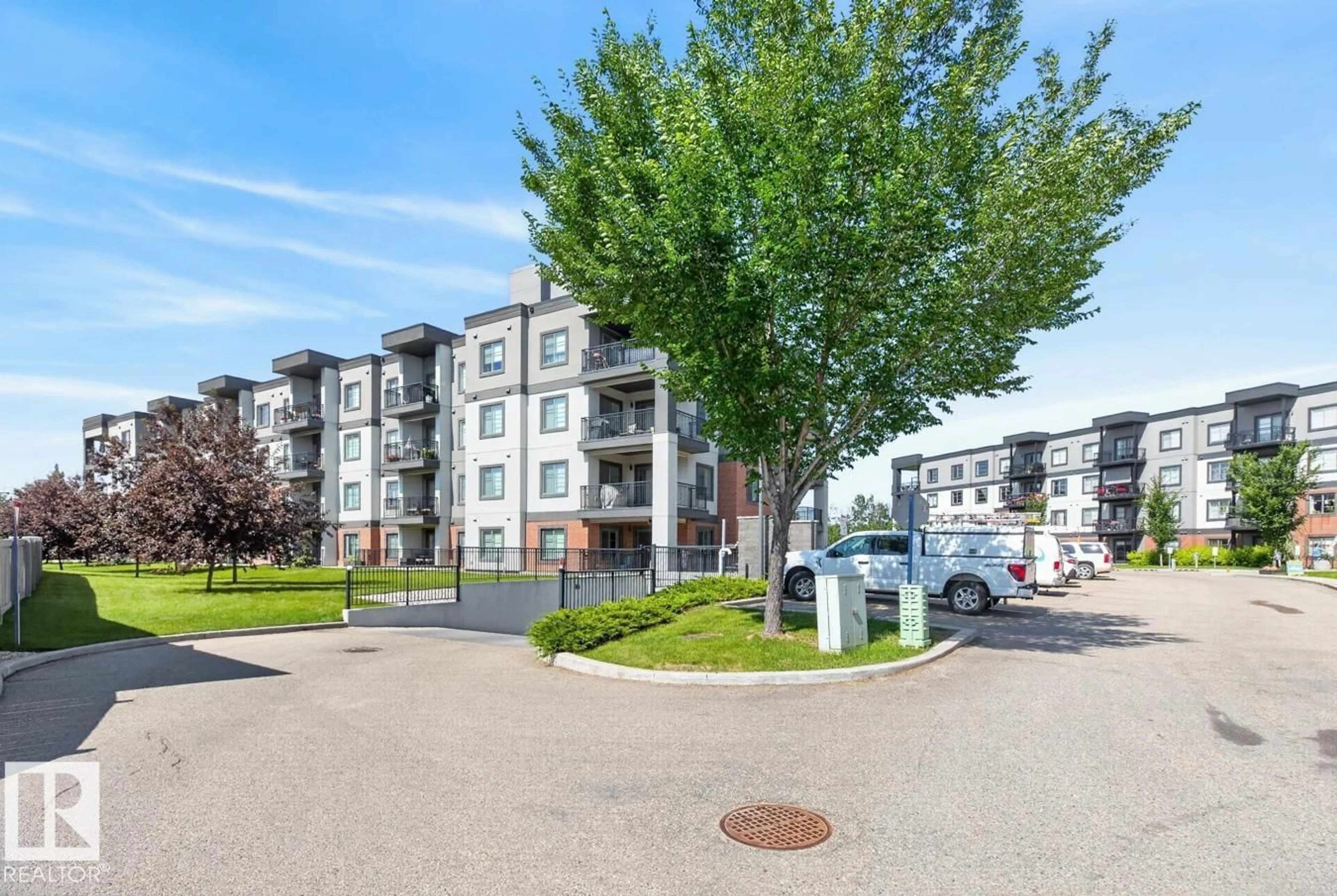A pic from outside/outdoor area/front of a property/back of a property/a pic from drone, street for 307 - 1144 ADAMSON DR, Edmonton Alberta T6W2X7