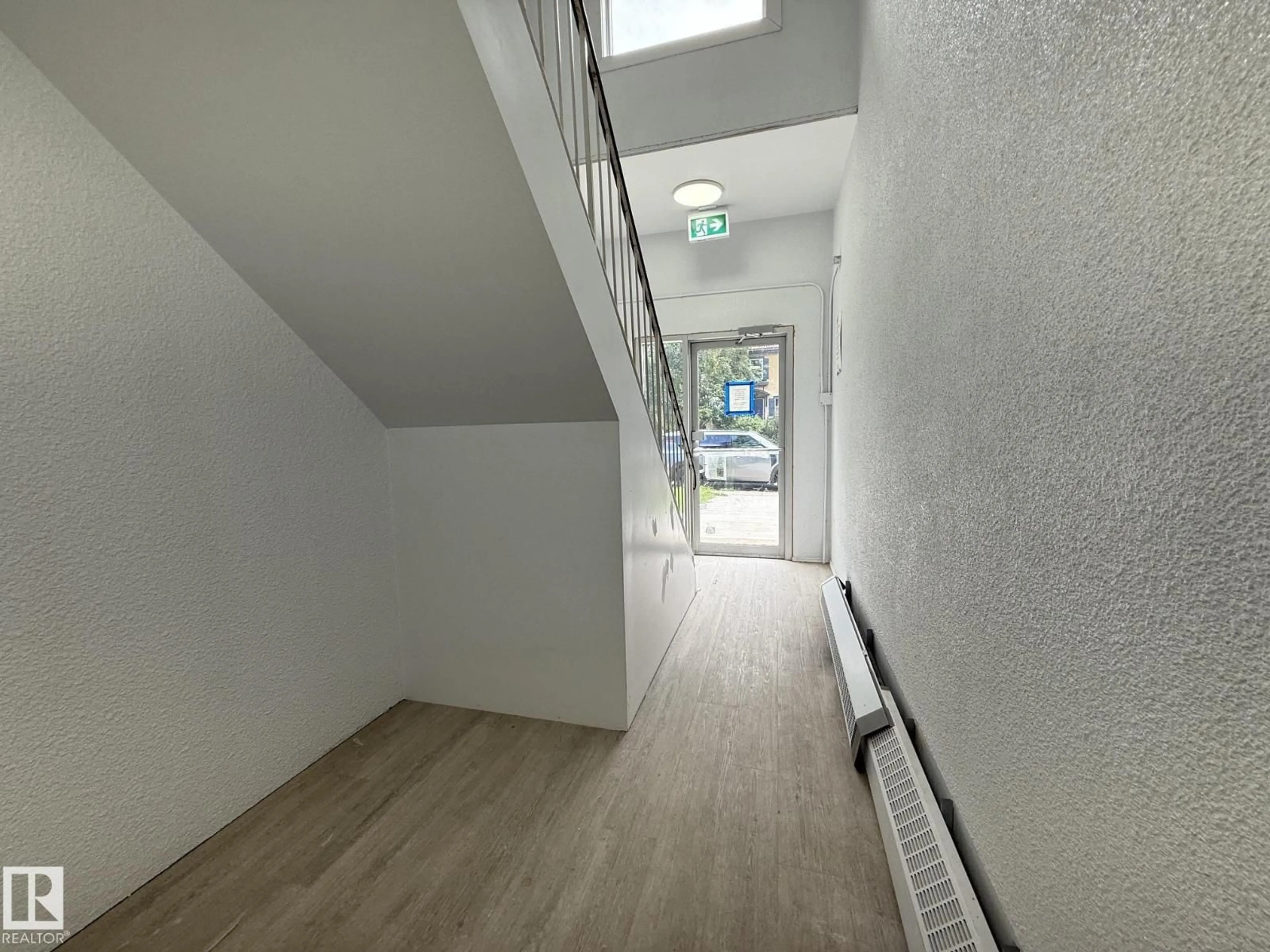 Indoor foyer for 8732 101 AV, Edmonton Alberta T5H0A9