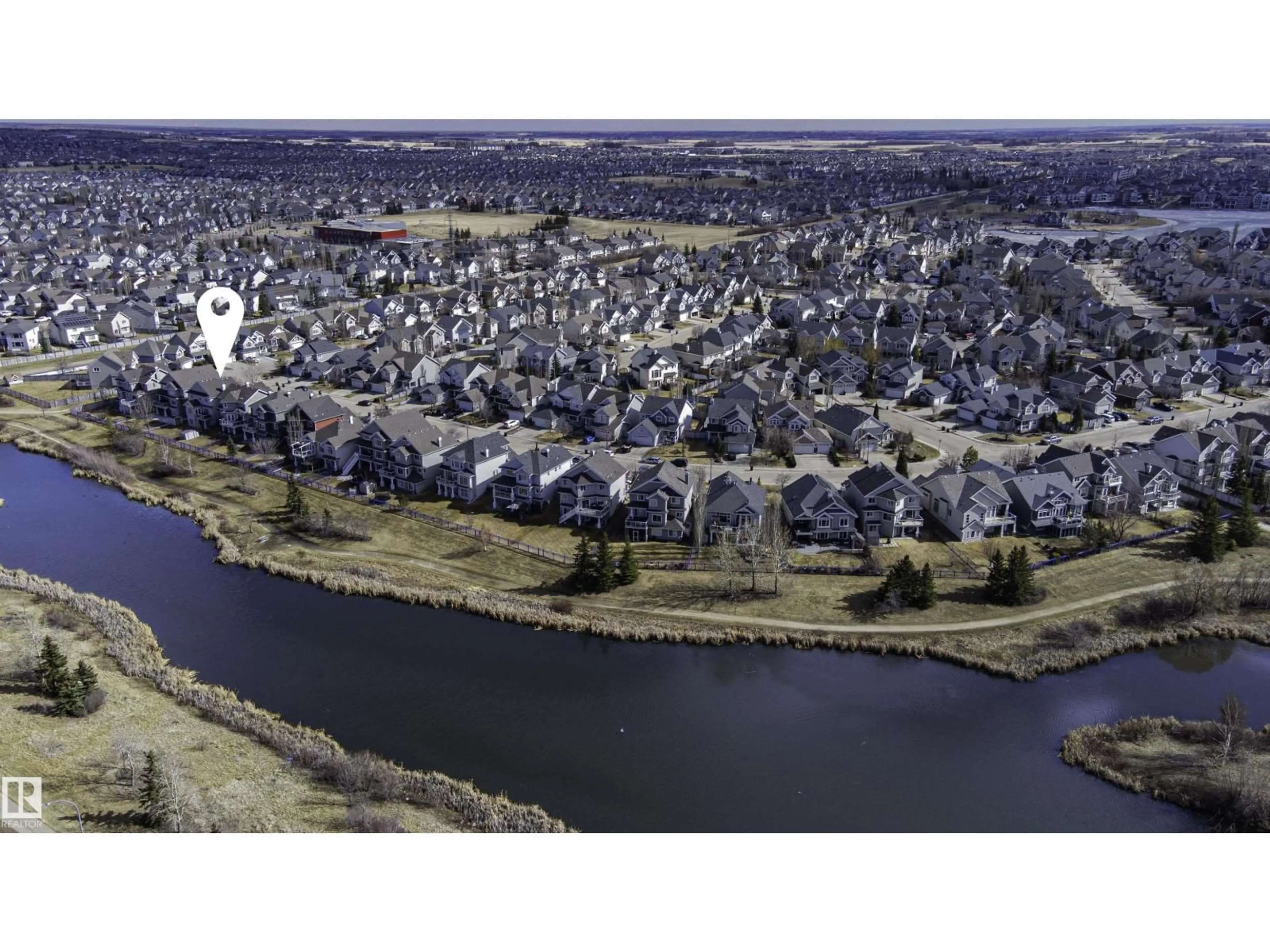 A pic from outside/outdoor area/front of a property/back of a property/a pic from drone, water/lake/river/ocean view for 551 STEWART CR, Edmonton Alberta T6X0A8