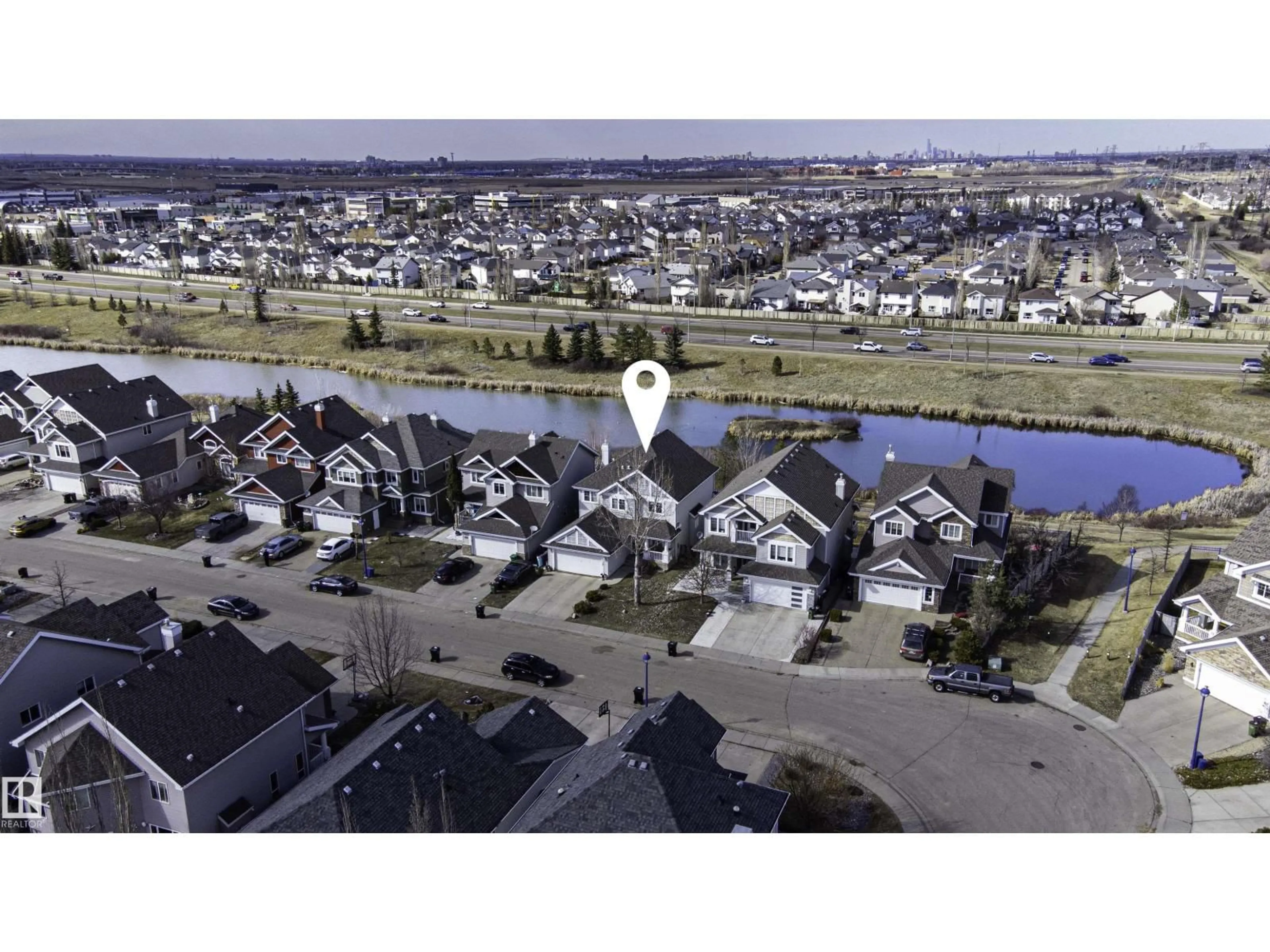 A pic from outside/outdoor area/front of a property/back of a property/a pic from drone, water/lake/river/ocean view for 551 STEWART CR, Edmonton Alberta T6X0A8