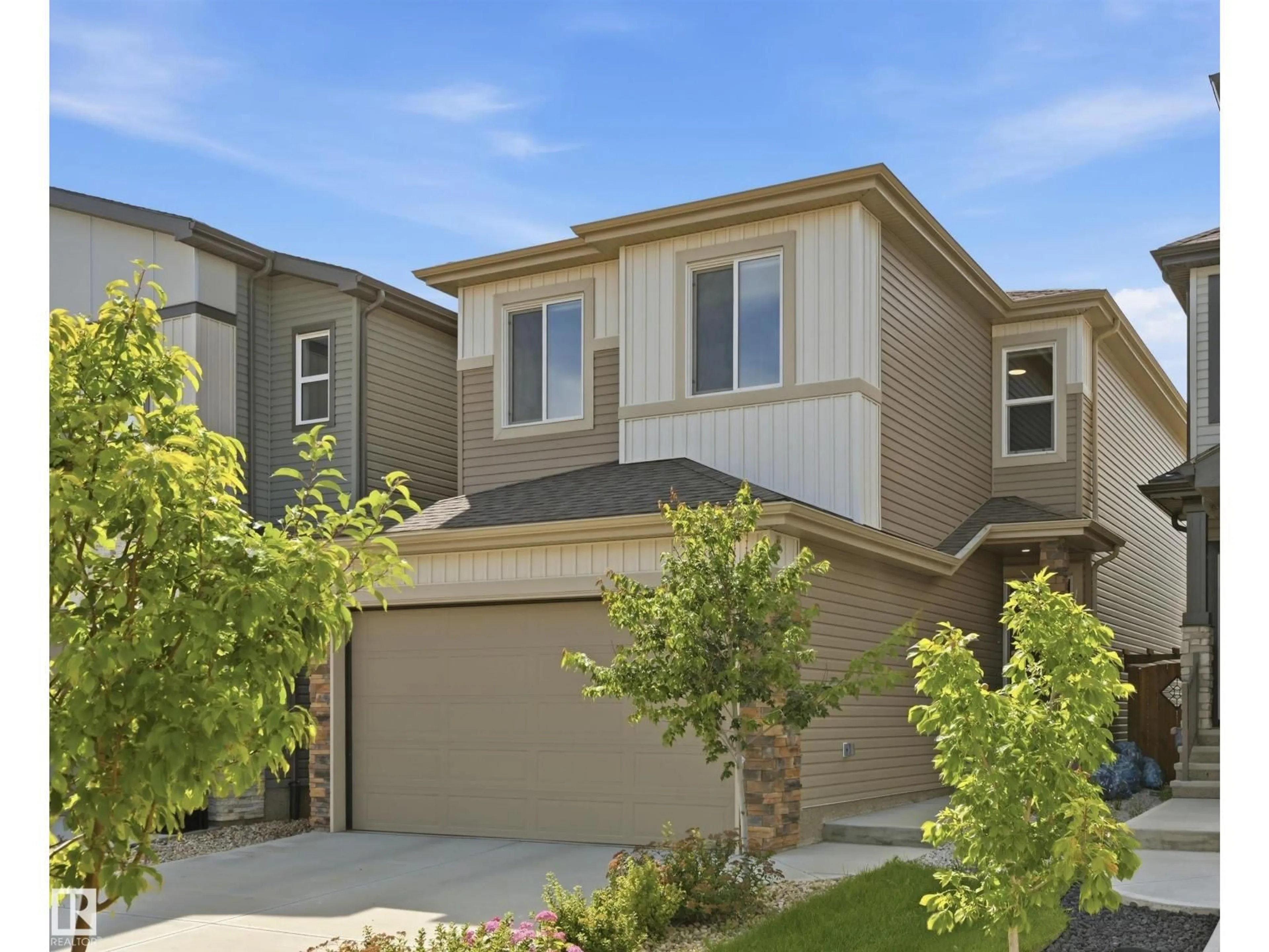 Home with brick exterior material, street for 185 LARCH CR, Leduc Alberta T9E1N2