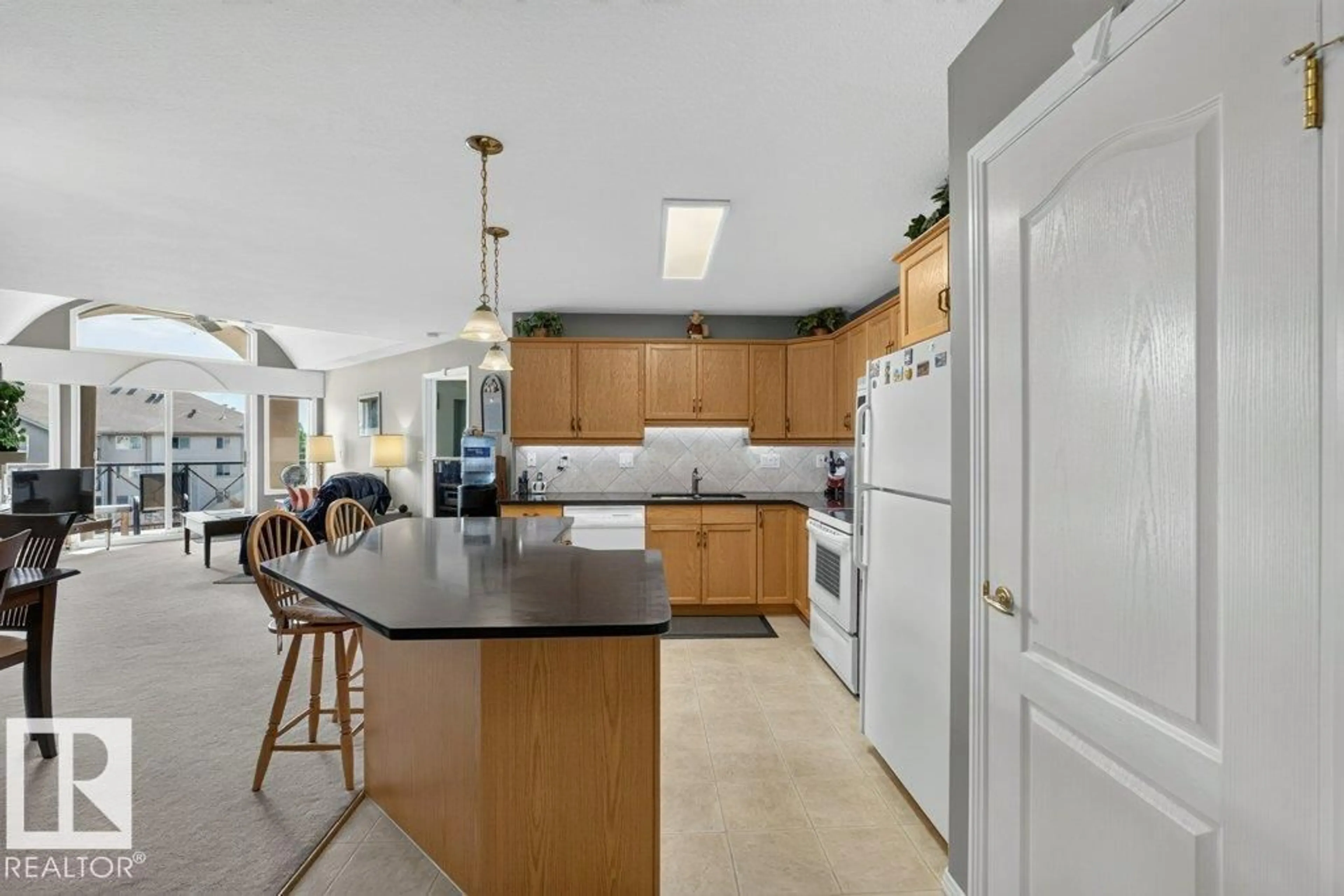 Open concept kitchen, ceramic/tile floor for 411 - 8922 156 ST NW, Edmonton Alberta T5R5Z3