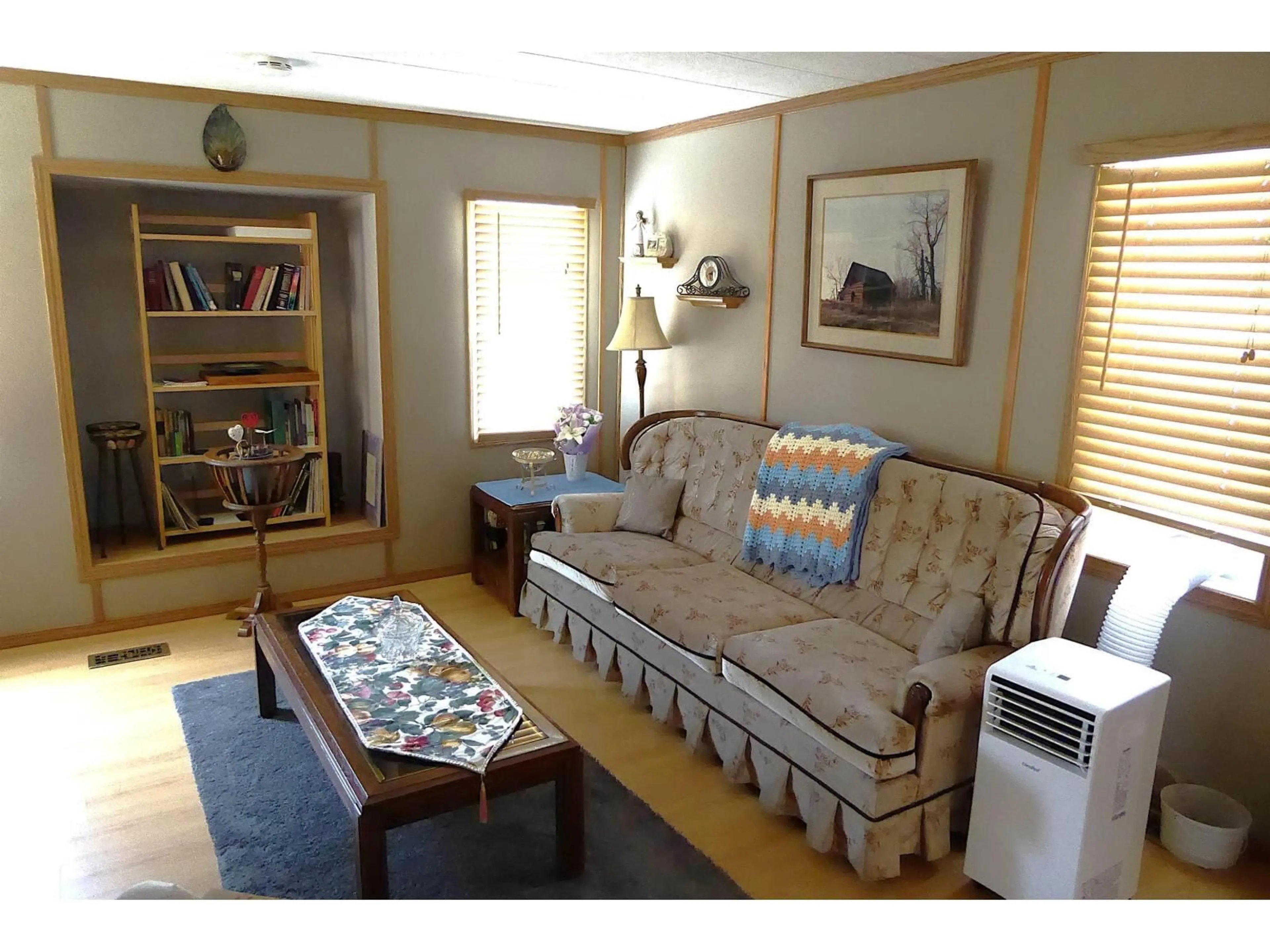 Living room with furniture, wood/laminate floor for 14 305 CALAHOO RD, Spruce Grove Alberta T7X3K5