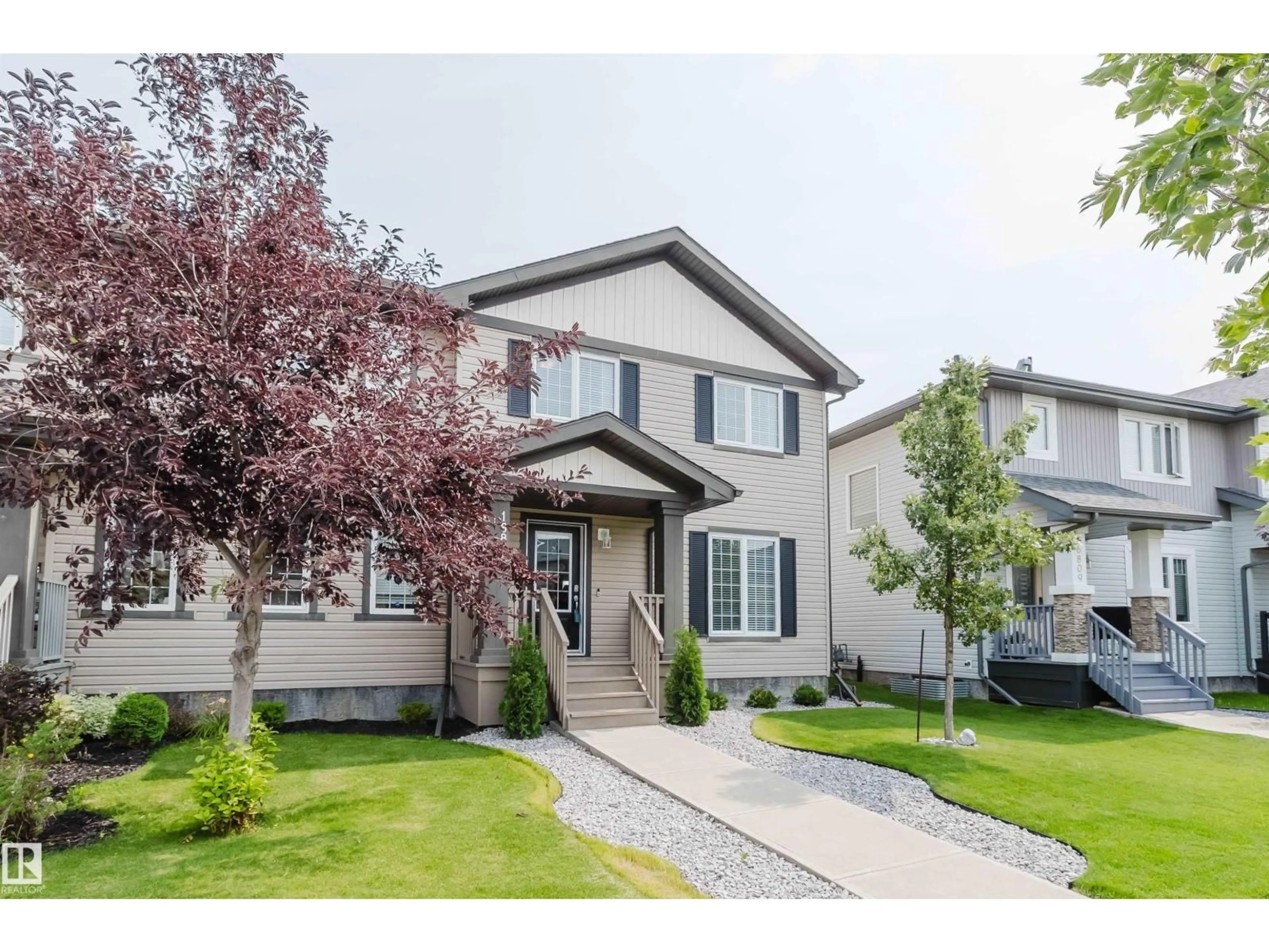 Home with vinyl exterior material, street for 16811 40 ST, Edmonton Alberta T5Y0Y2