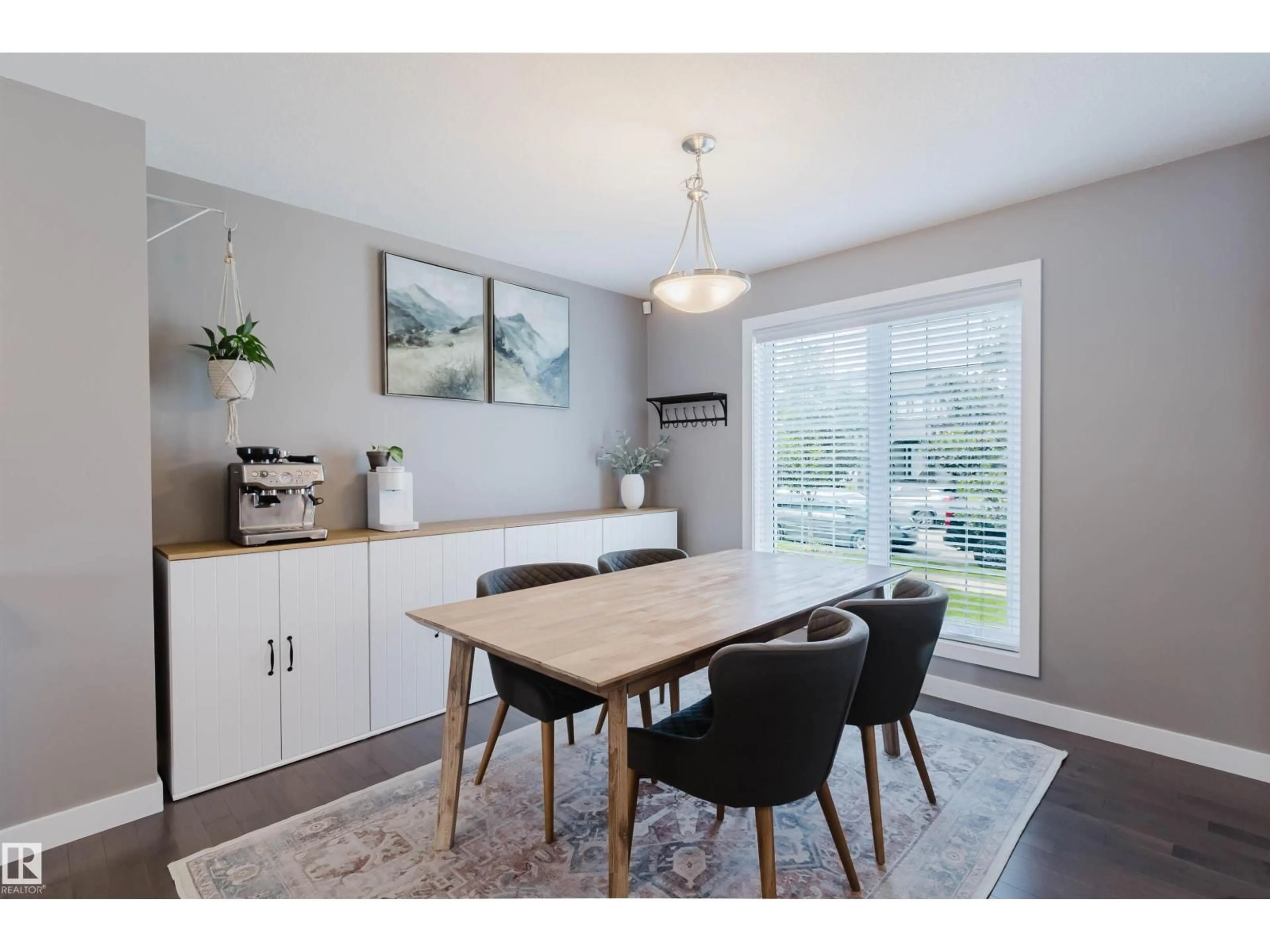 Dining room, wood/laminate floor for 16811 40 ST, Edmonton Alberta T5Y0Y2