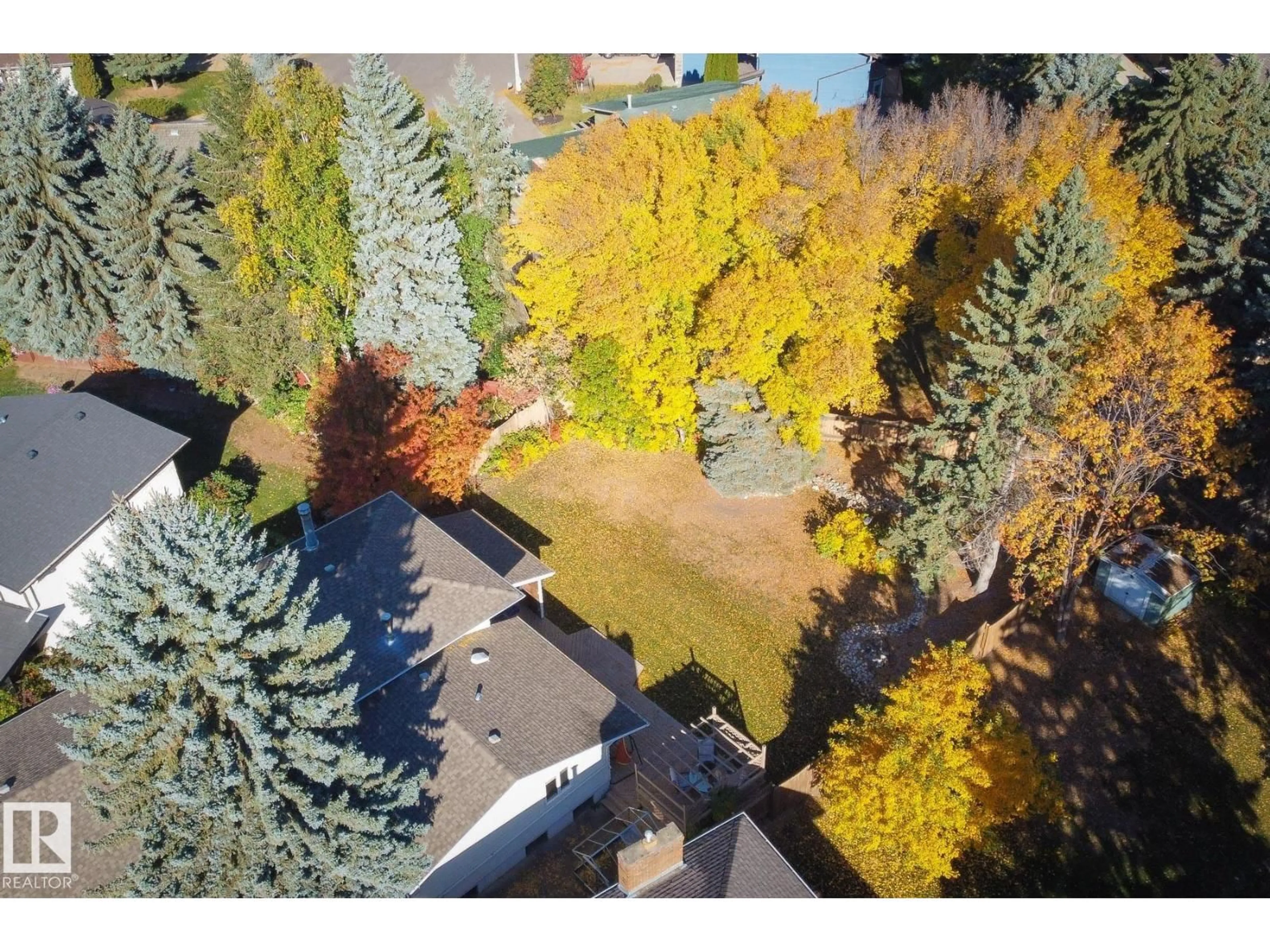 A pic from outside/outdoor area/front of a property/back of a property/a pic from drone, forest/trees view for 38 LANCASTER CR, St. Albert Alberta T8N2N8
