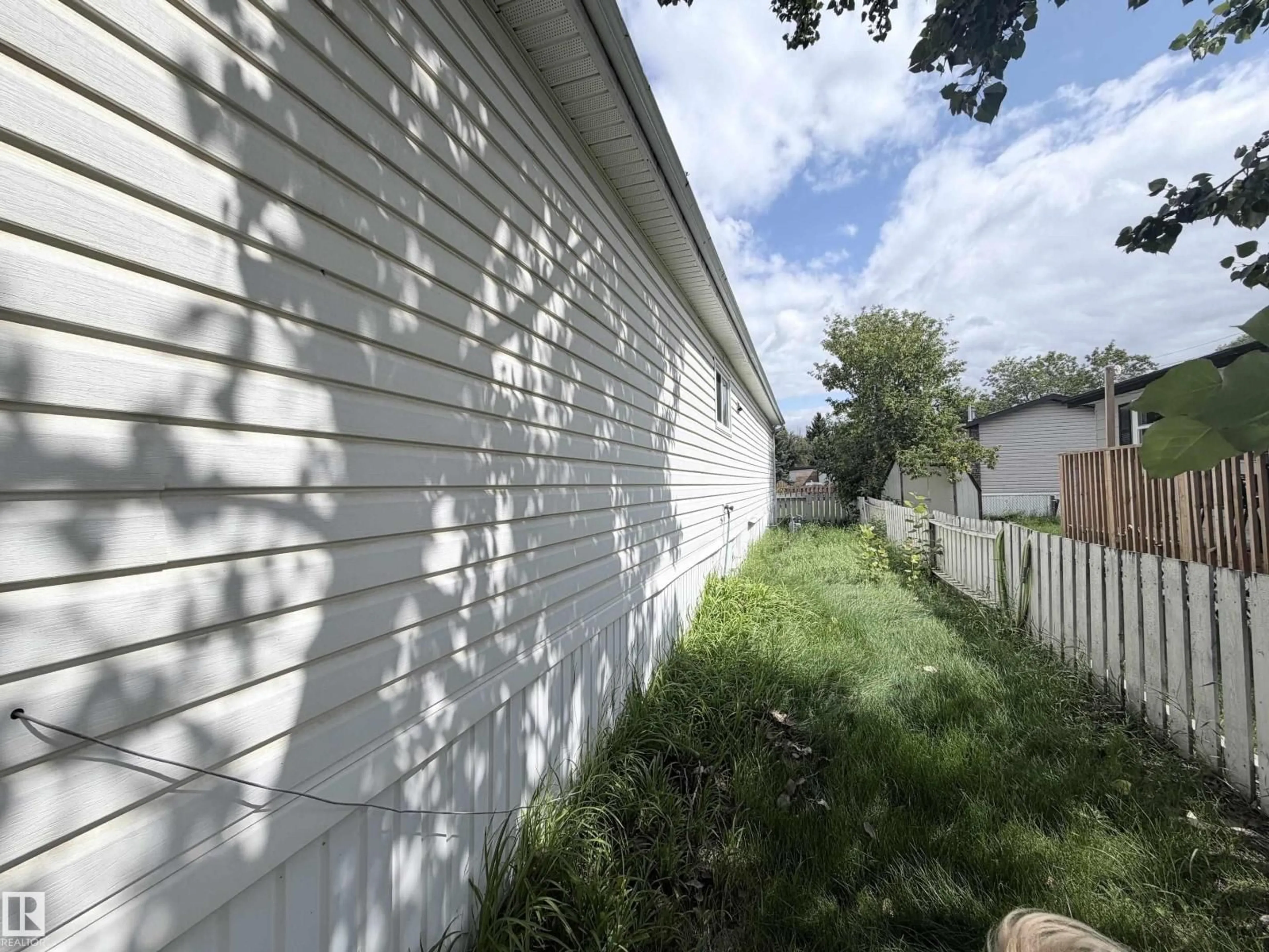 Home with vinyl exterior material, street for 66 THE PARKWAY NW, Edmonton Alberta T6P1G2