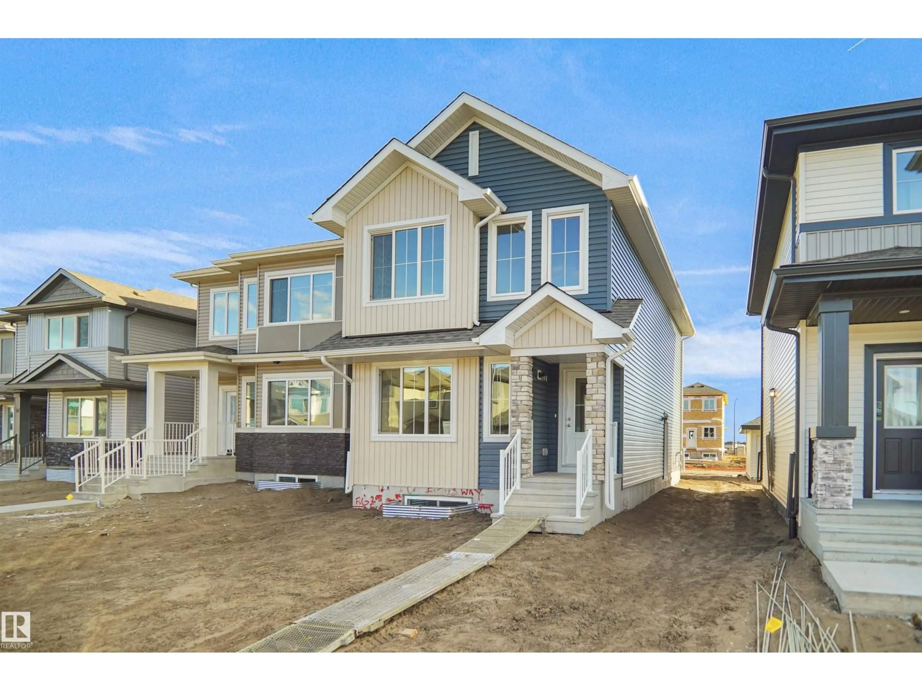Home with vinyl exterior material, street for 221 FALCON CR, Leduc Alberta T0B3M3