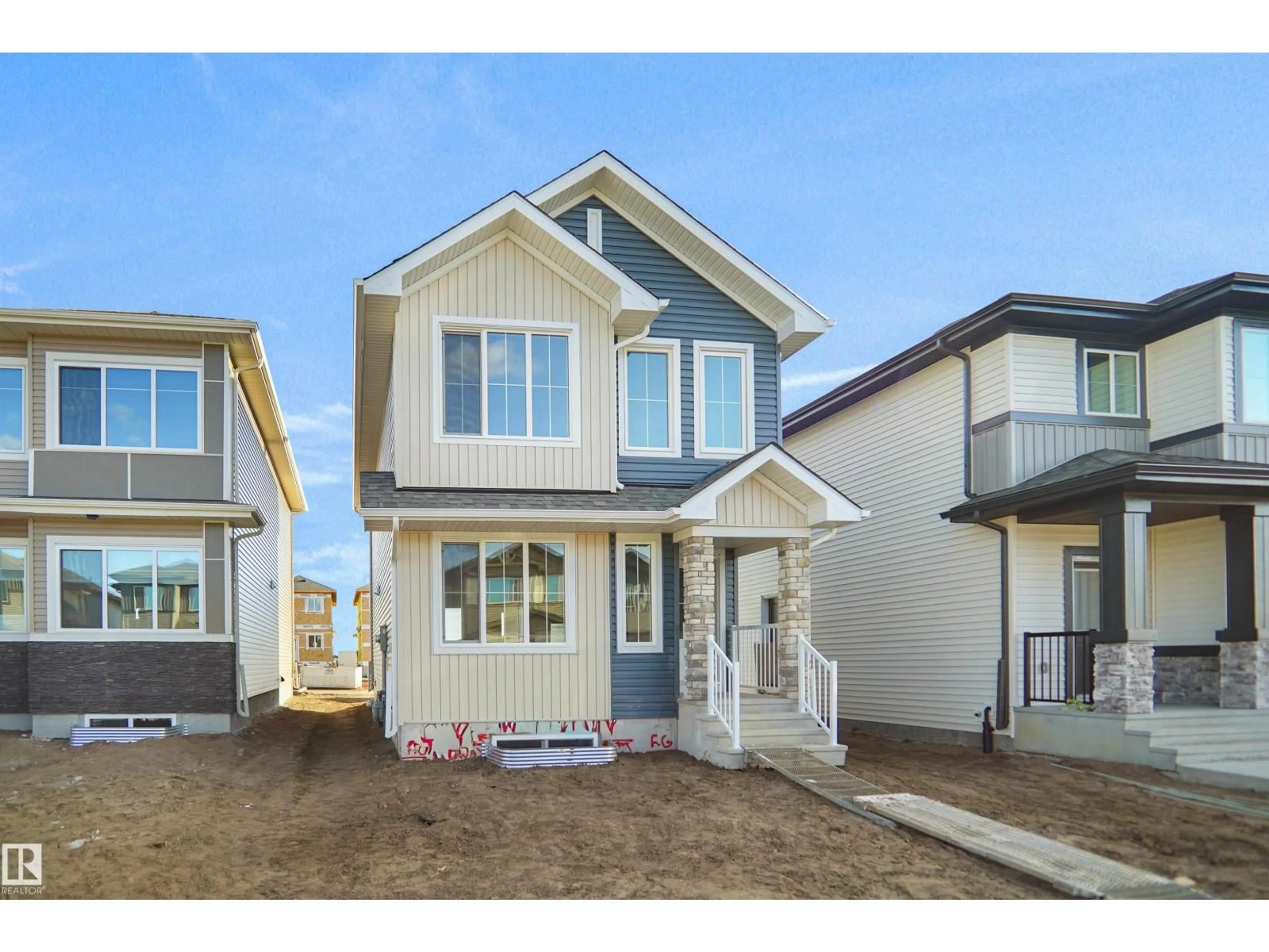 Home with vinyl exterior material, street for 221 FALCON CR, Leduc Alberta T0B3M3