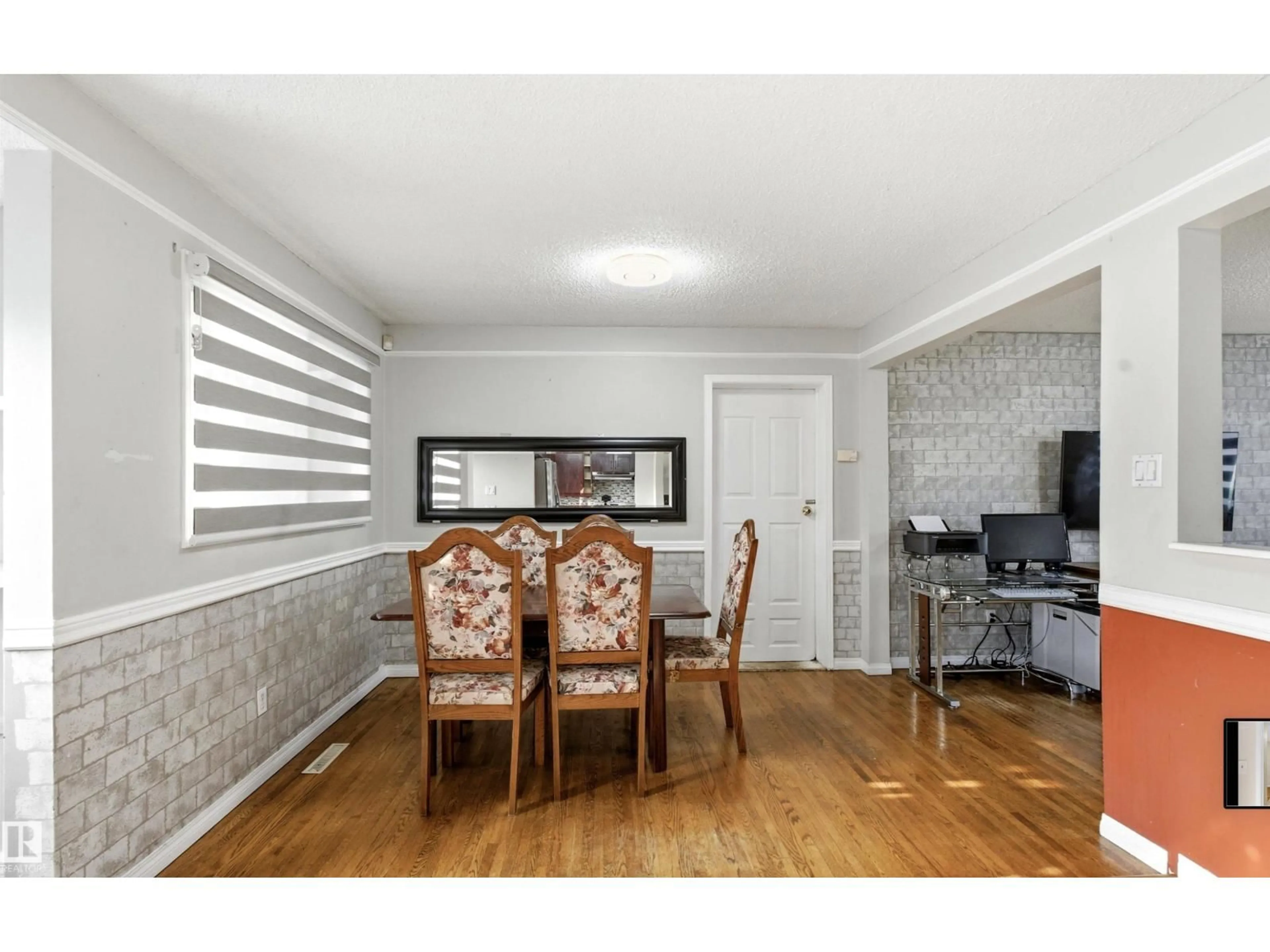 Dining room, wood/laminate floor for 13604 90A ST NW, Edmonton Alberta T5E3N8