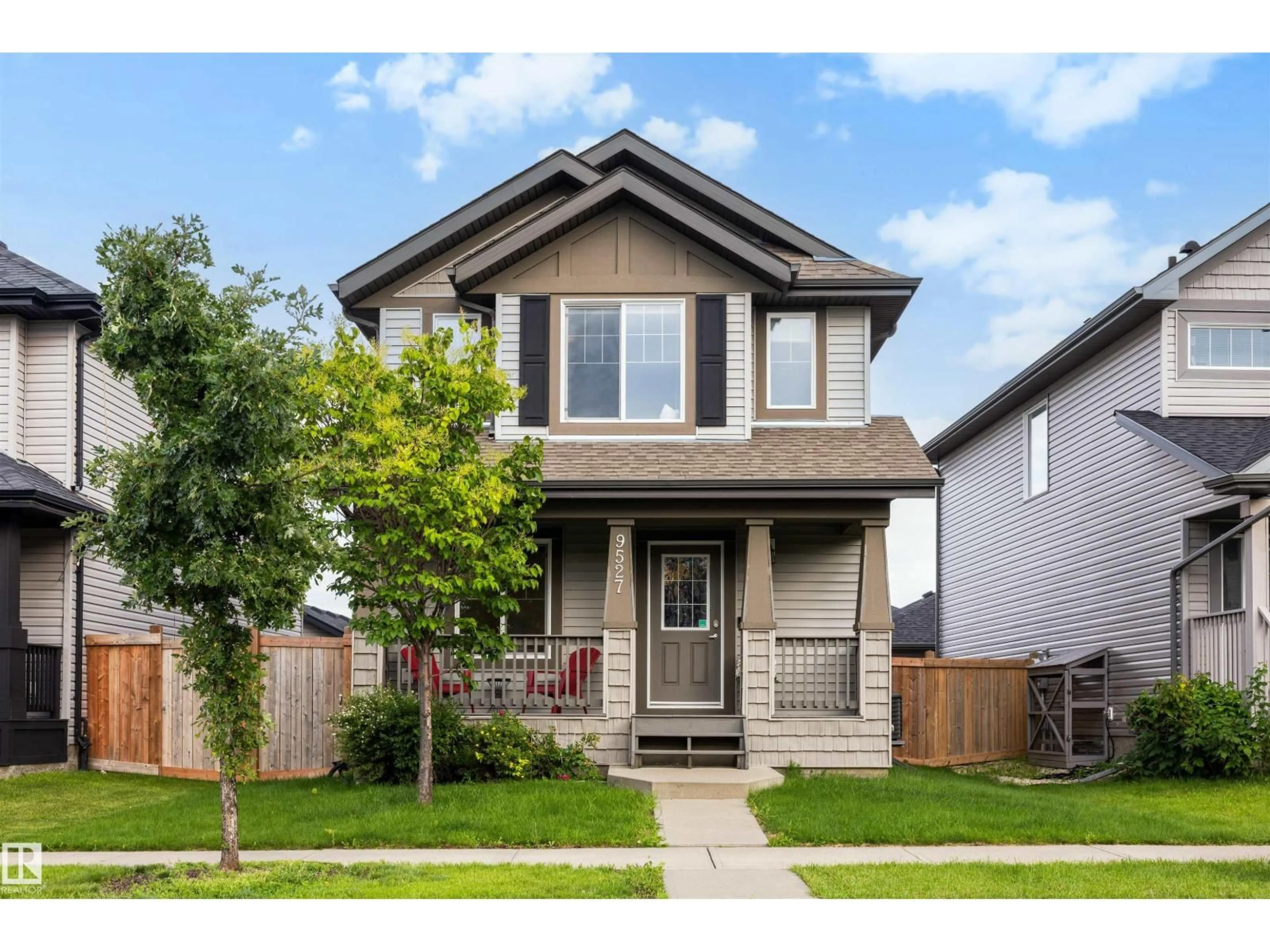 Home with brick exterior material, street for 9527 212 ST, Edmonton Alberta T5T4J6
